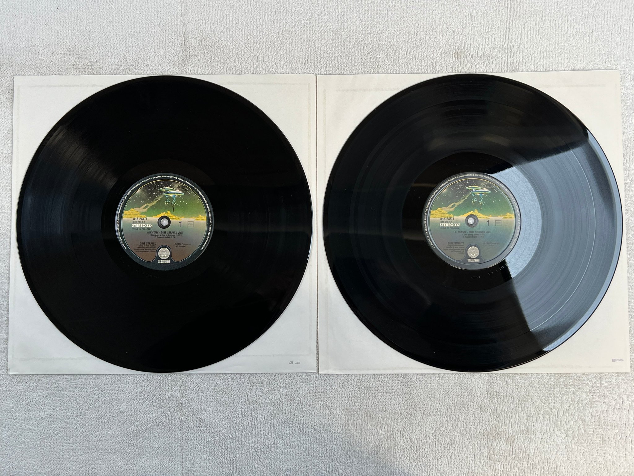 Omslagsbild för skivan DIRE STRAITS alchemy LP -84 Hol VERTIGO 818245-1