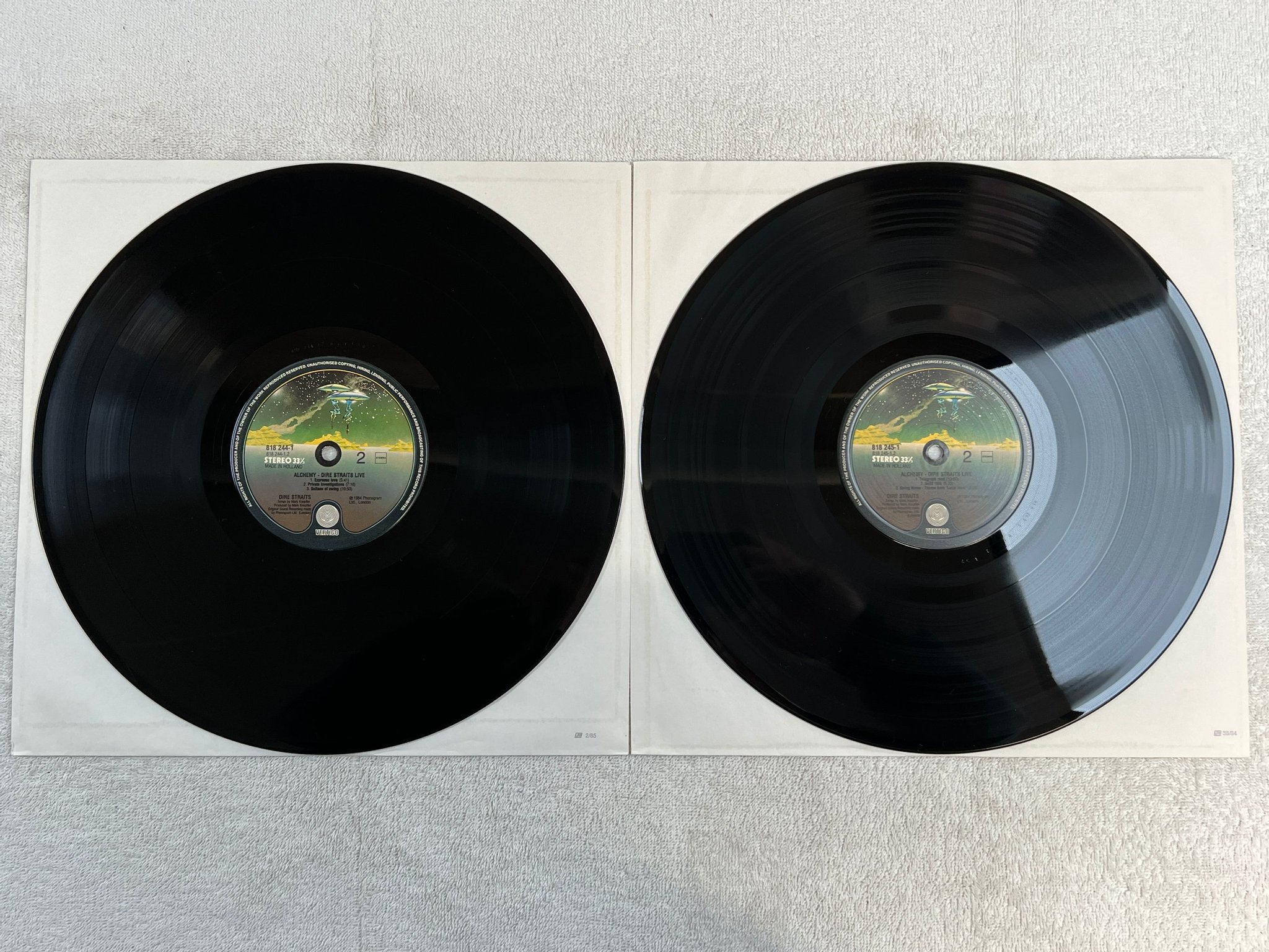 Omslagsbild för skivan DIRE STRAITS alchemy LP -84 Hol VERTIGO 818245-1