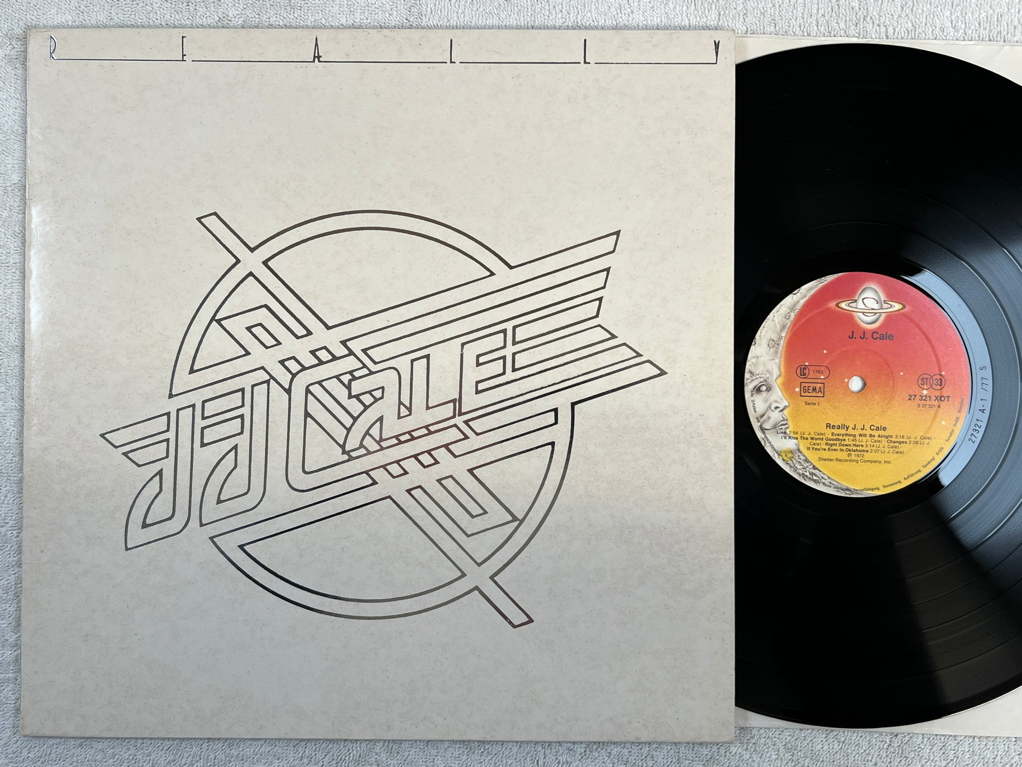 Omslagsbild för skivan JJ CALE really LP re Ger SHELTER 27321 XOT golden promo stamp