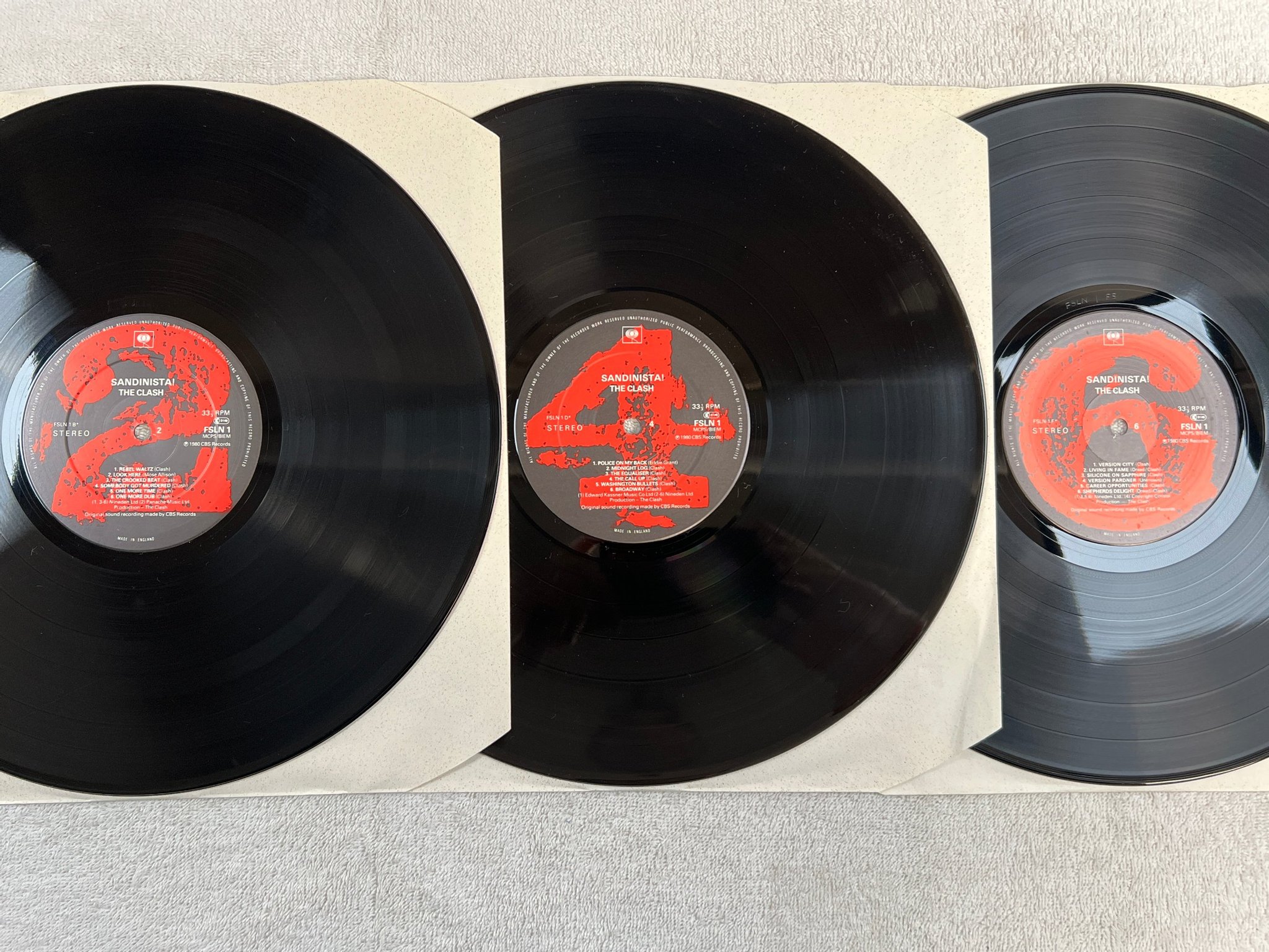 Omslagsbild för skivan THE CLASH sandinista! 3xLP -80 UK CBS FSLN 1 