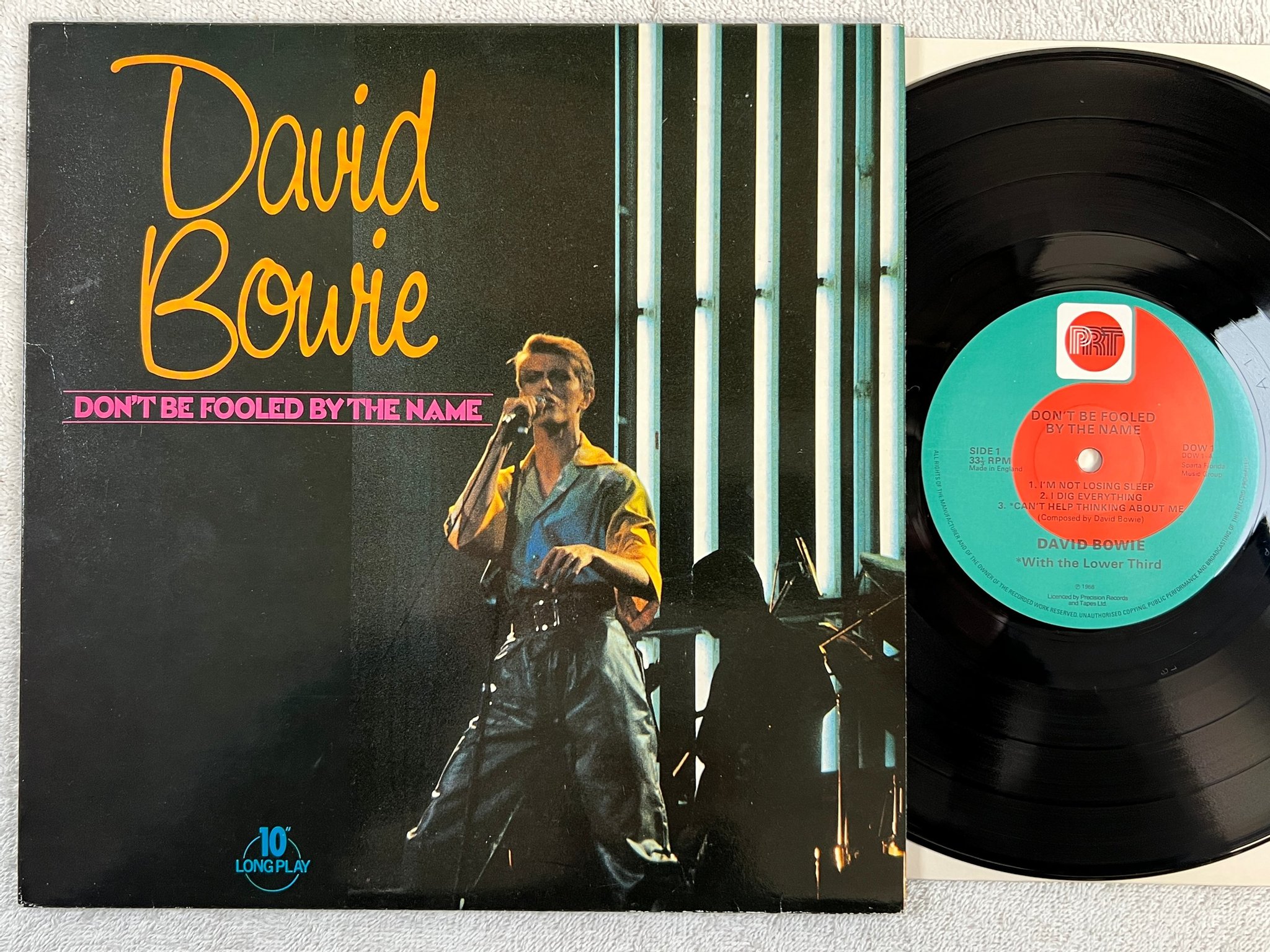 Omslagsbild för skivan DAVID BOWIE by the name 10"lp UK PRT DOW-1