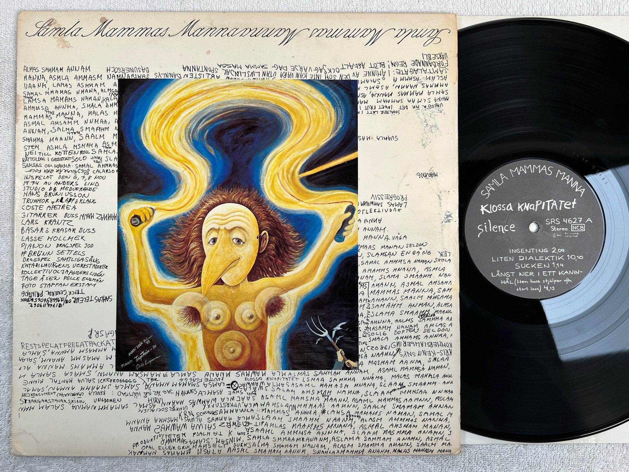 Omslagsbild för skivan SAMLA MAMMAS MANNA Klossa Knapitatet LP -76 Swe SILENCE  SRS 4627