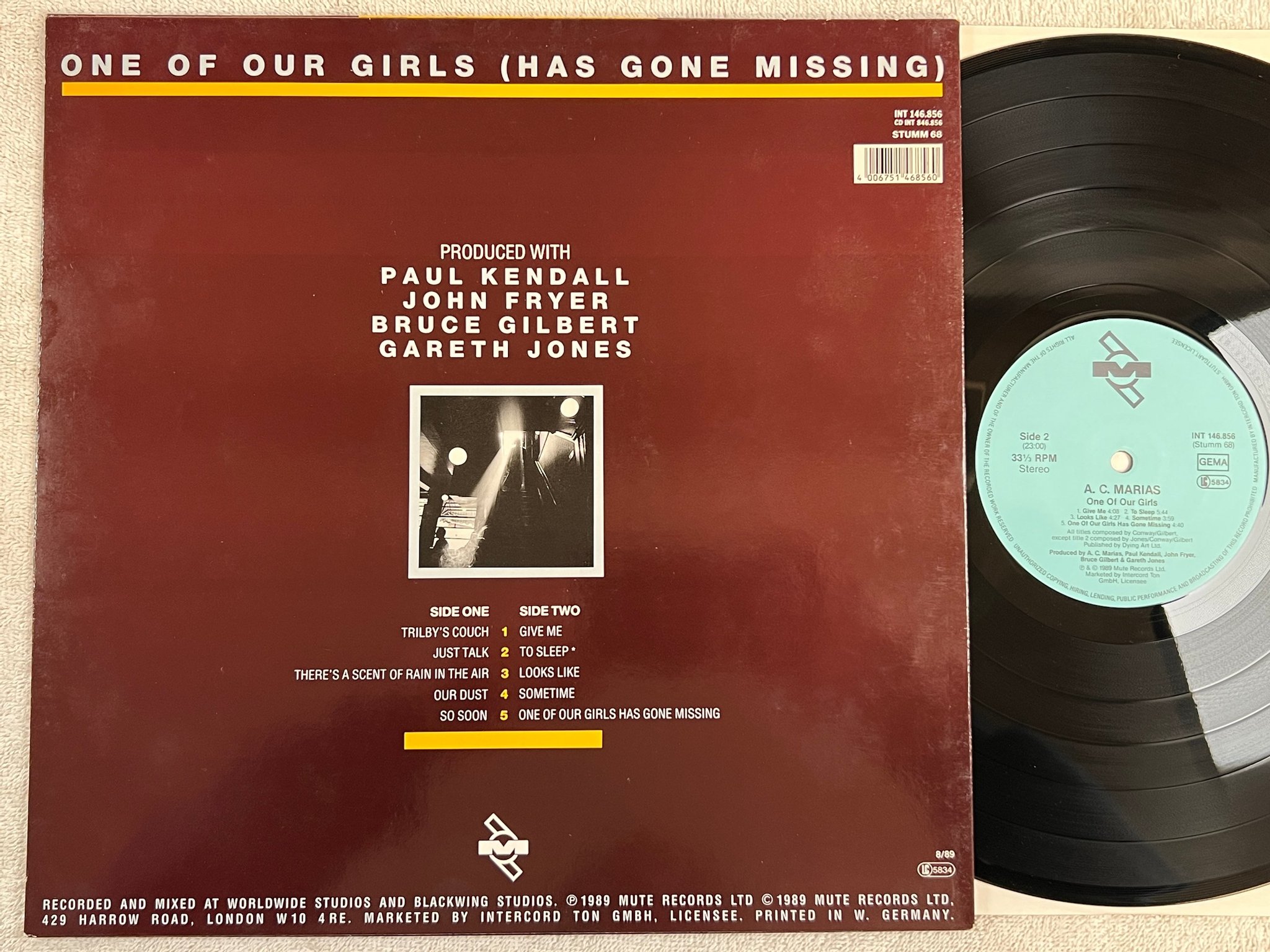 Omslagsbild för skivan A.C. MARIAS One Of Our Girls LP -89 Ger MUTE INT 146856 electronic art rock