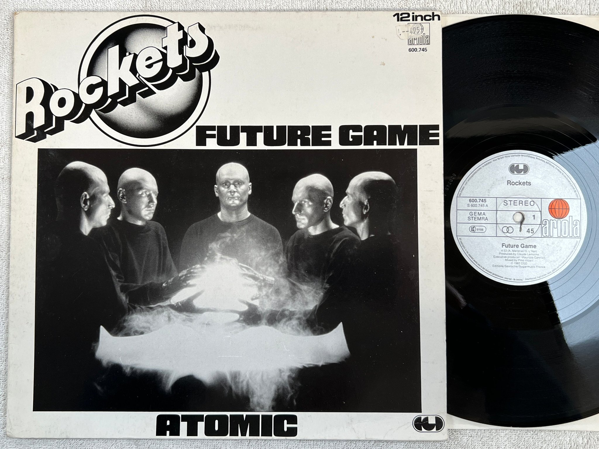 Omslagsbild för skivan ROCKETS Future Game / Atomic 12"single LP -82 Ger ARIOLA 600745 SPACE DISCO 