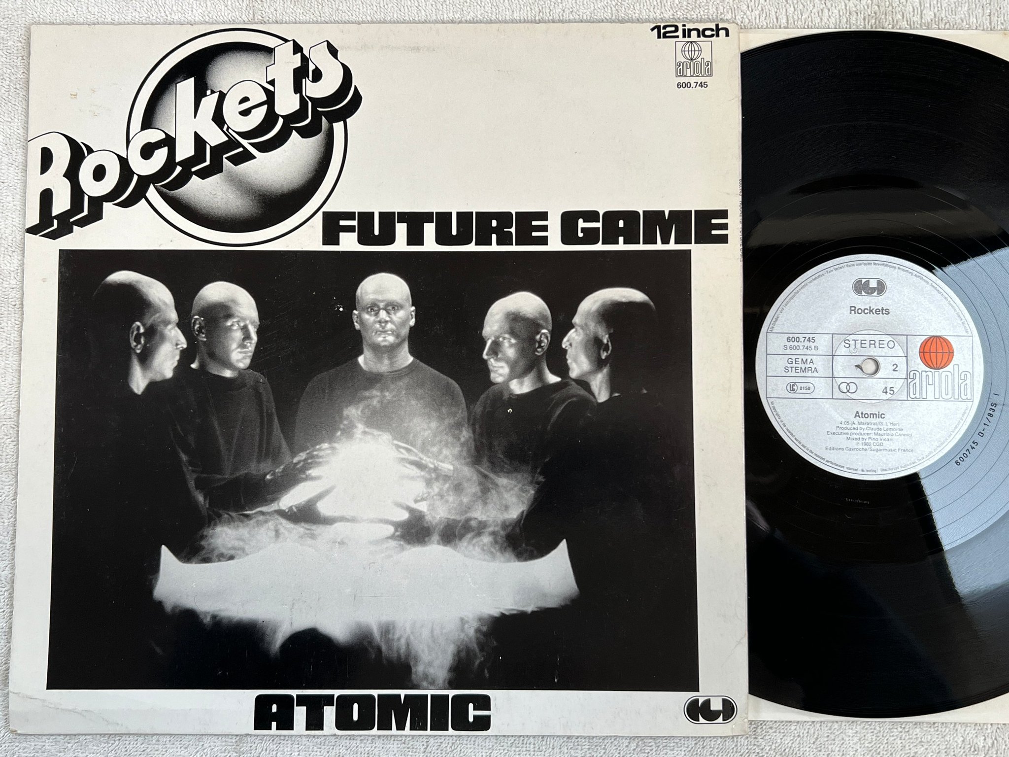 Omslagsbild för skivan ROCKETS Future Game / Atomic 12"single LP -82 Ger ARIOLA 600745 SPACE DISCO 