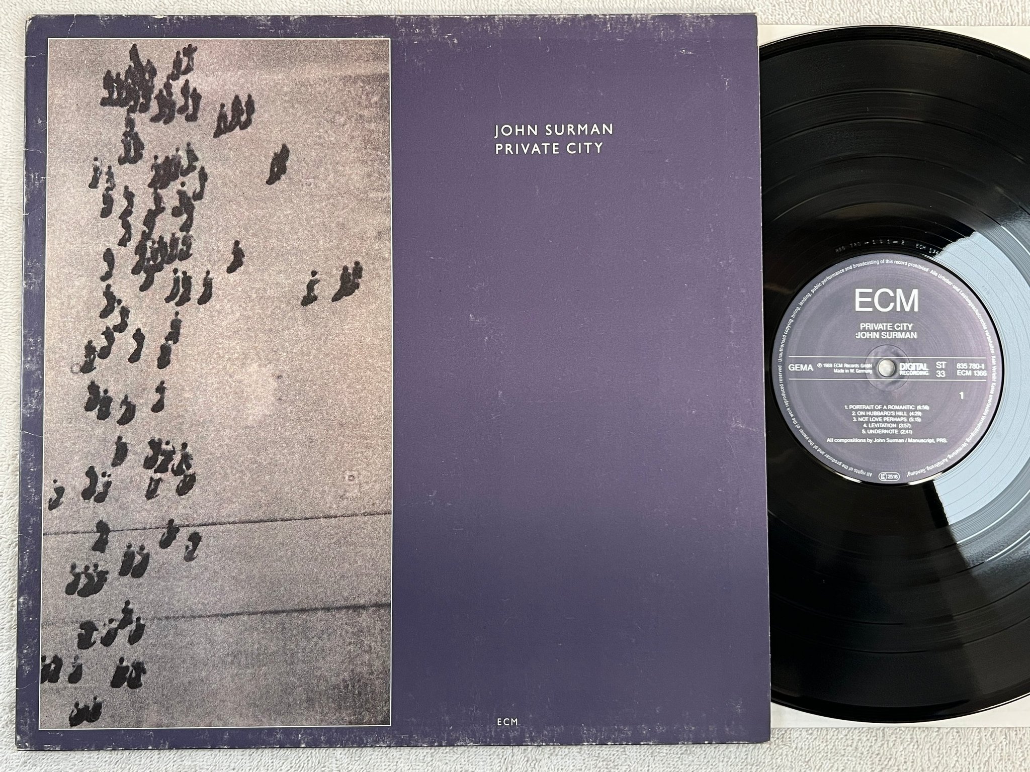 Omslagsbild för skivan JOHN SURMAN Private City LP -88 Ger ECM 1366 