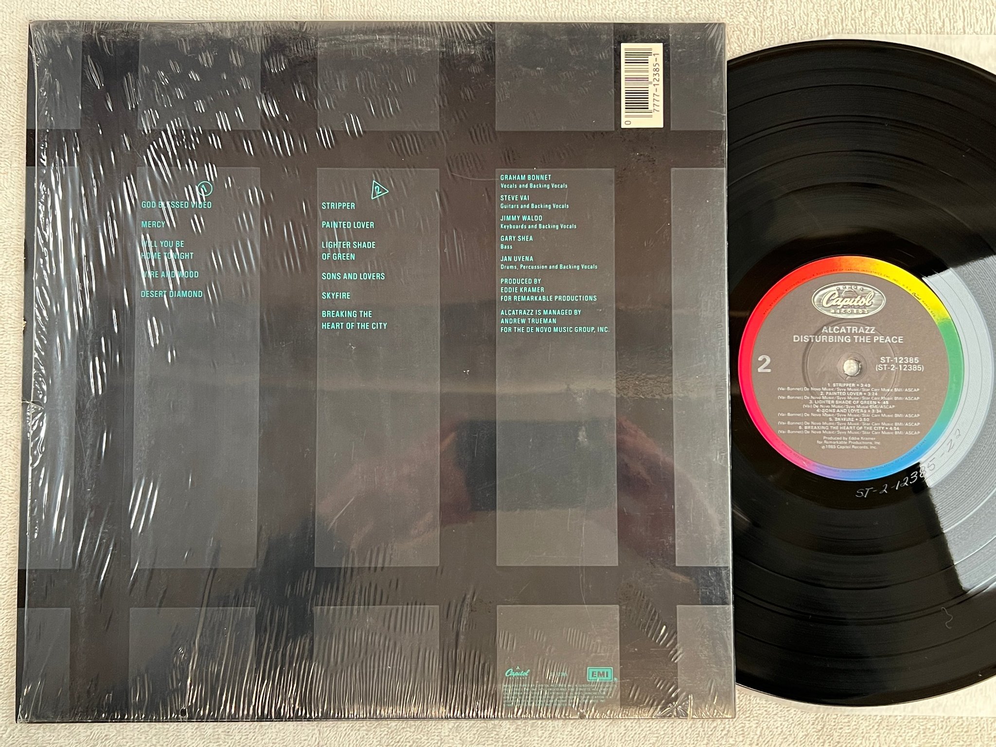 Omslagsbild för skivan ALCATRAZZ disturbing the peace LP -85 US CAPITOL ST 12385