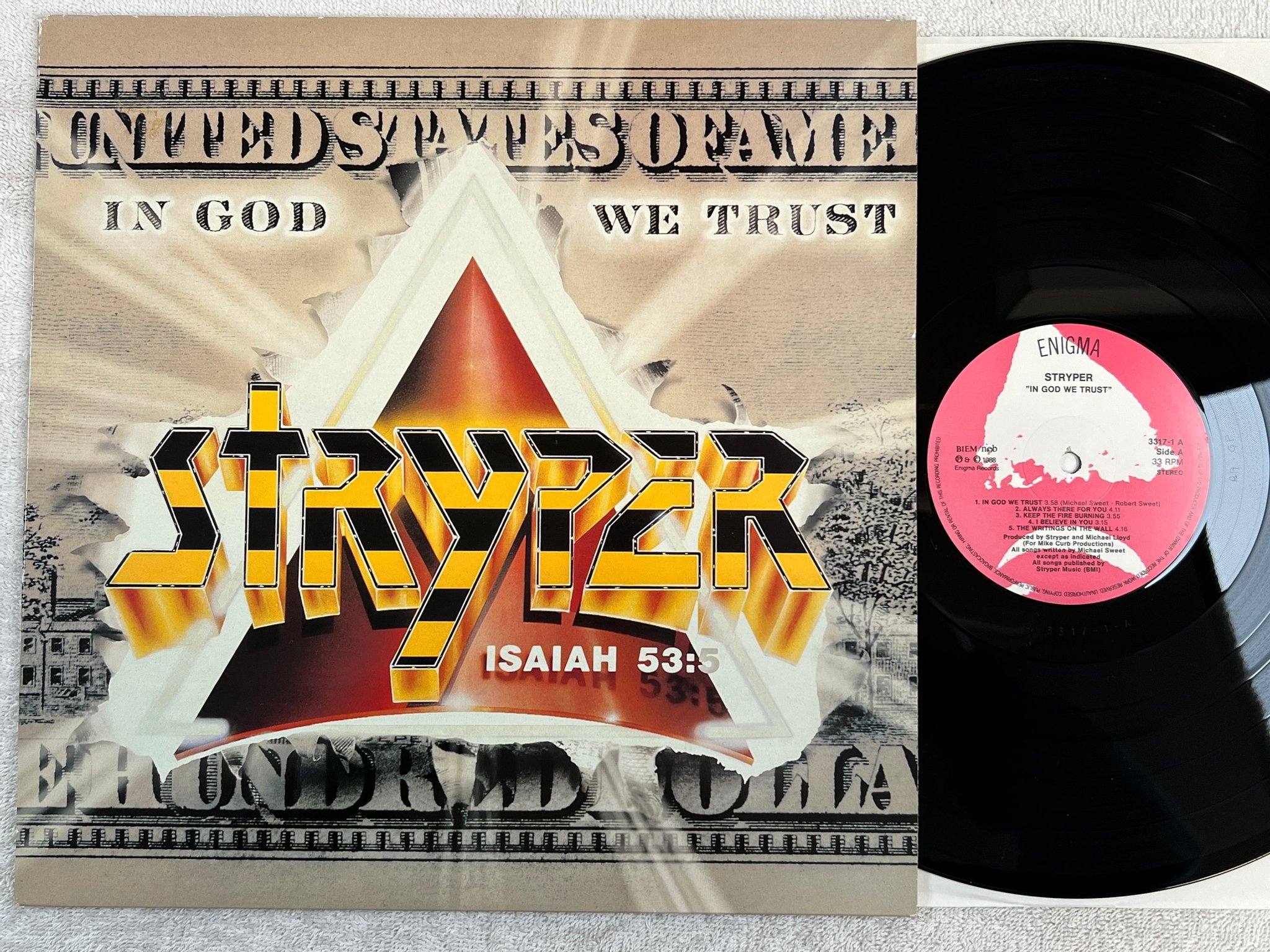 Omslagsbild för skivan STRYPER in god we trust LP -88 ncb ENIGMA 3317-1