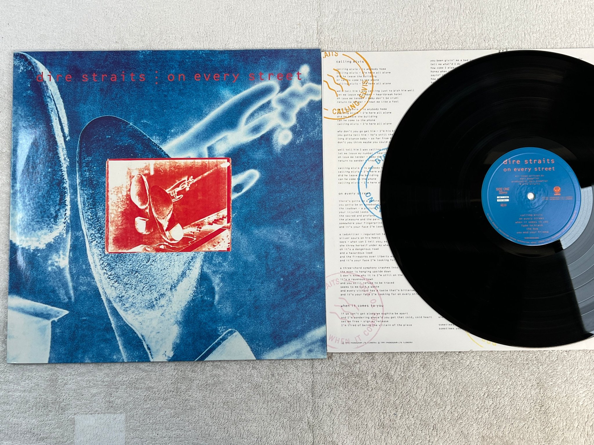 Omslagsbild för skivan DIRE STRAITS on every street LP -91 Hol VERTIGO 510160-1