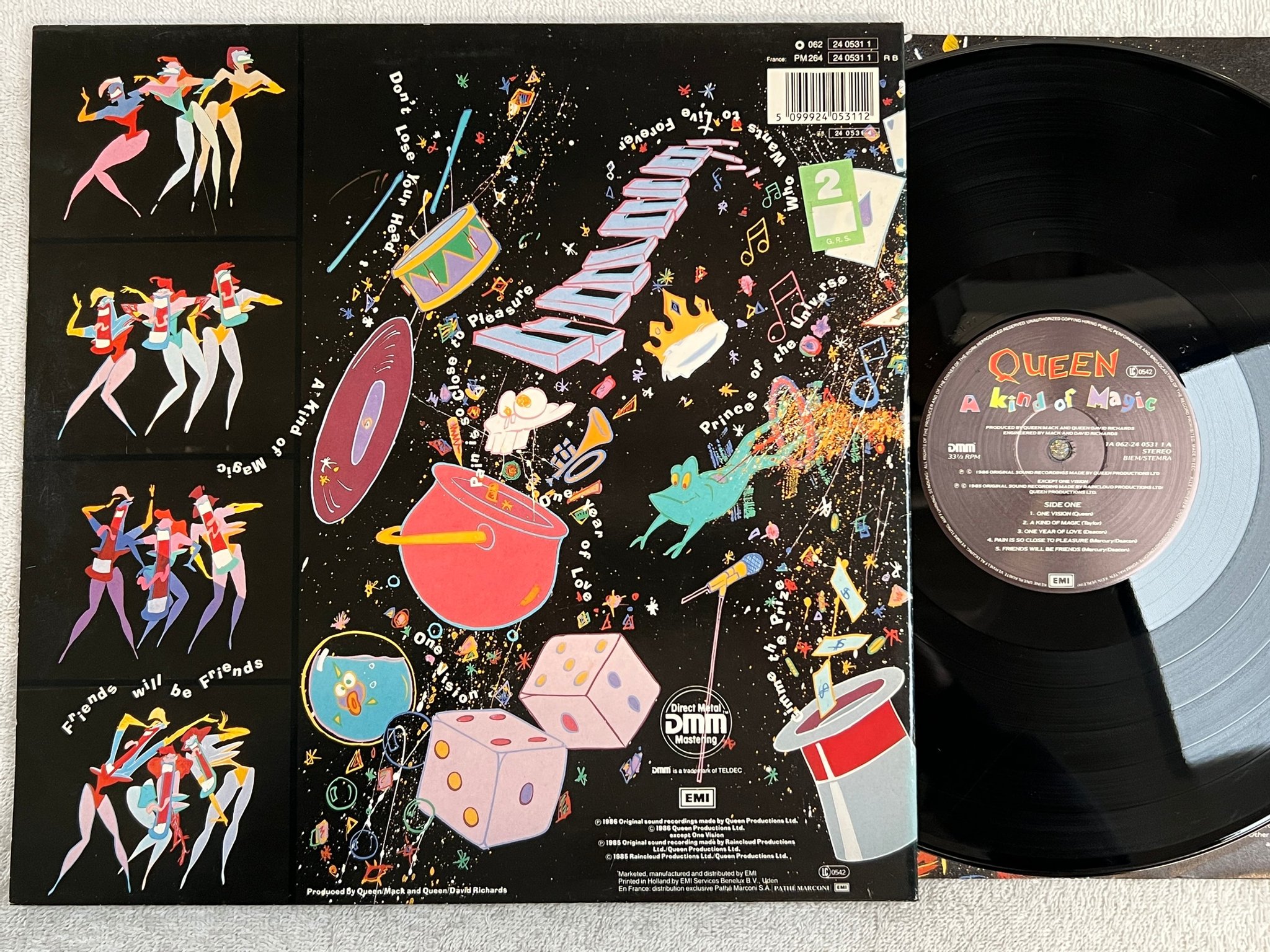 Omslagsbild för skivan QUEEN a kind of magic LP -86 Hol EMI 1A 062 2405311