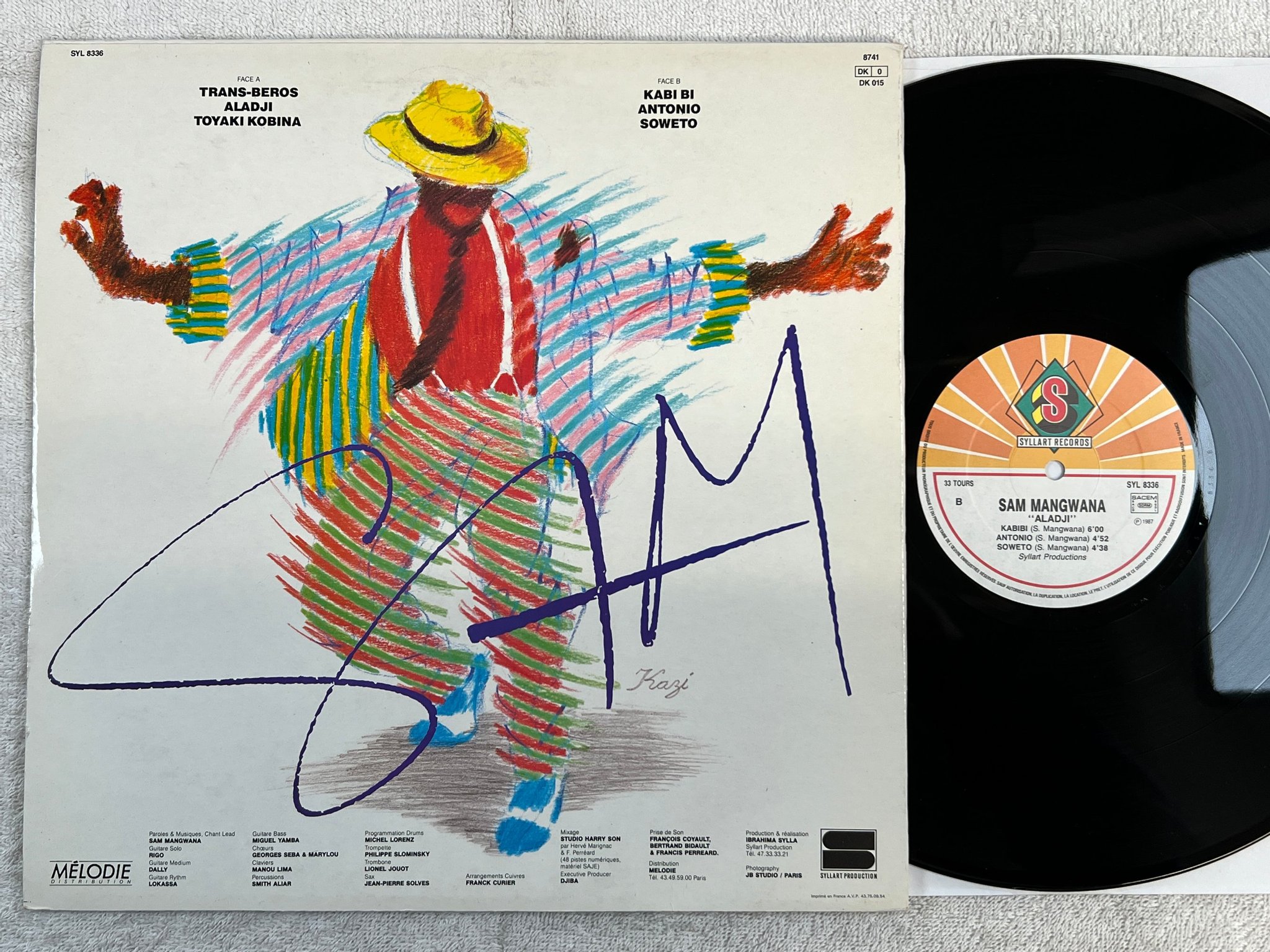 Omslagsbild för skivan SAM MANGWANA aladji LP -87 Fra SYLLART SYL 8336
