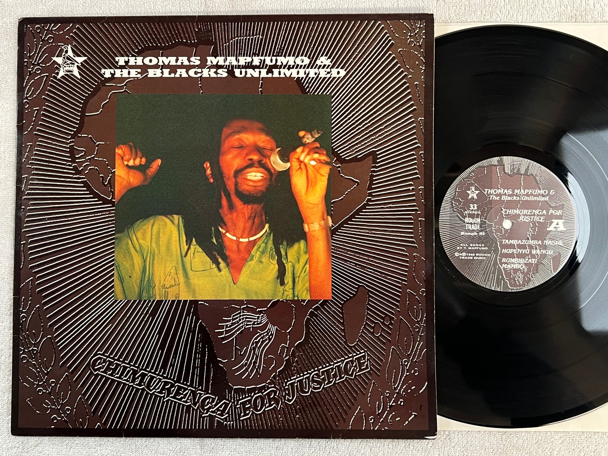 Omslagsbild för skivan THOMAS MAPFUMO & BLACKS UNLIMITED chimurenga for justice LP -85 UK ROUGH TRADE 