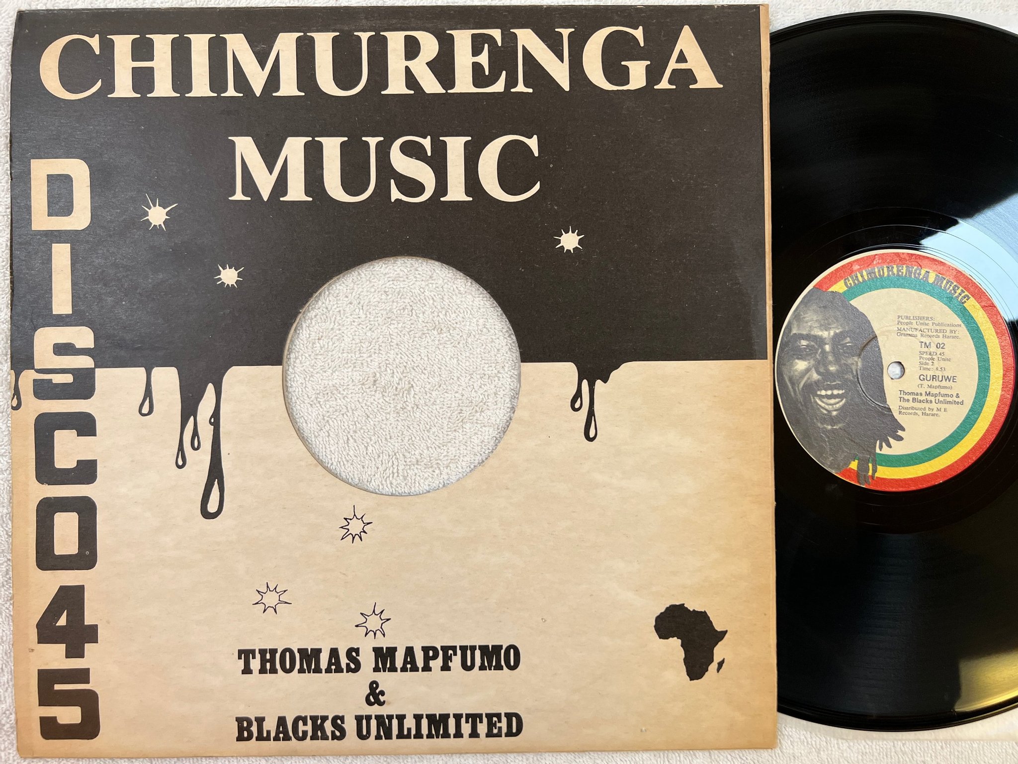 Omslagsbild för skivan THOMAS MAPFUMO & THE BLACKS UNLIMITED Kariba 12"single Zimbabwe CHIMURENGA TM 02