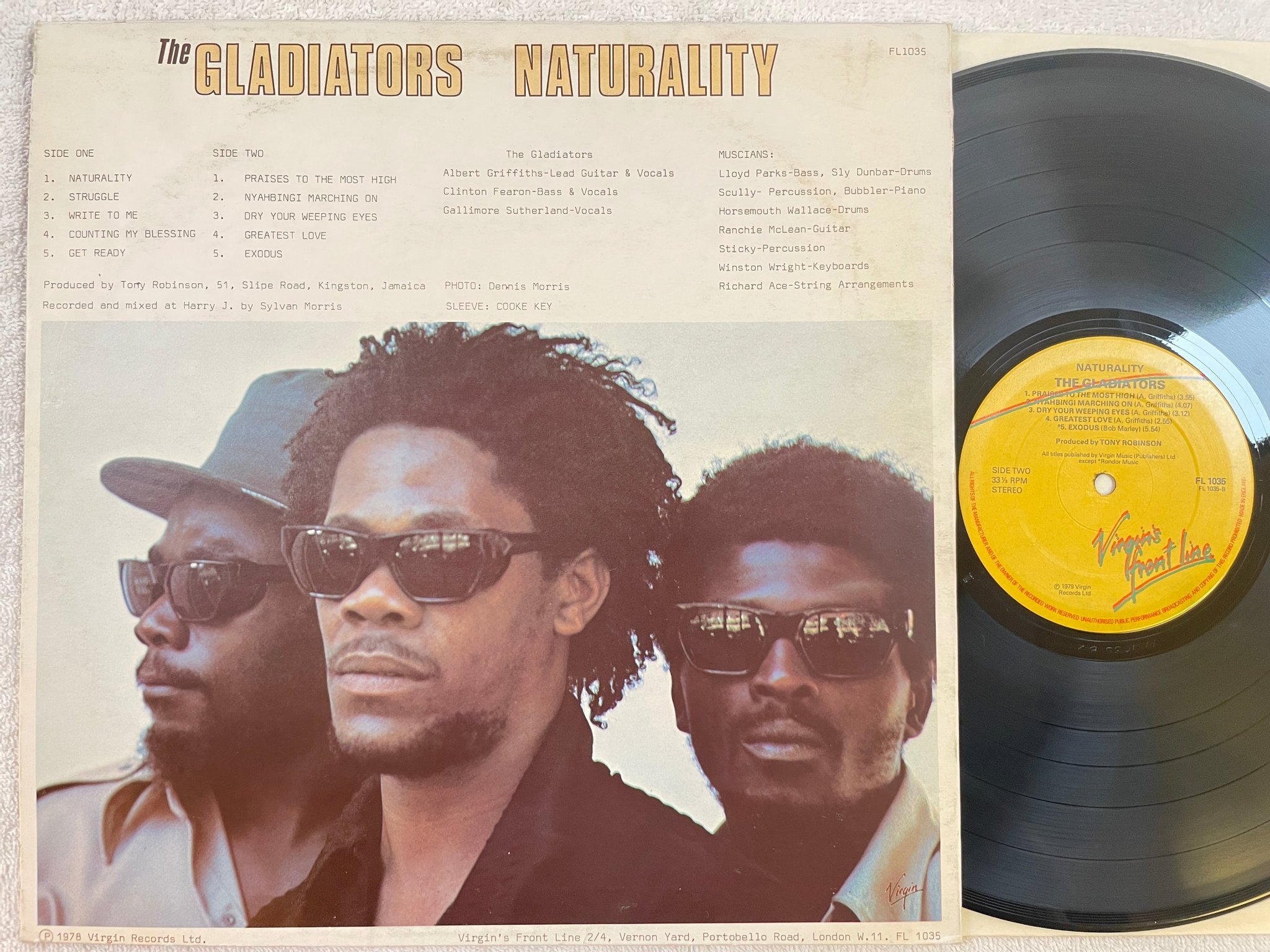 Omslagsbild för skivan THE GLADIATORS naturality LP -79 UK FRONT LINE FL 1035