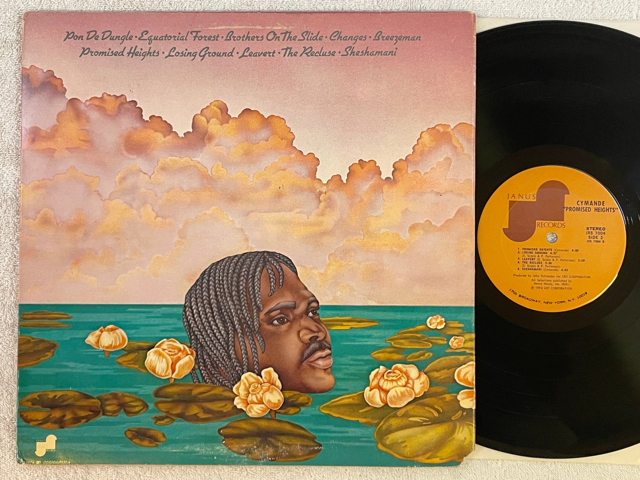 Omslagsbild för skivan CYMANDE promised heights LP -74 US JANUS jxs 7004 ** AMAZING ALBUM **