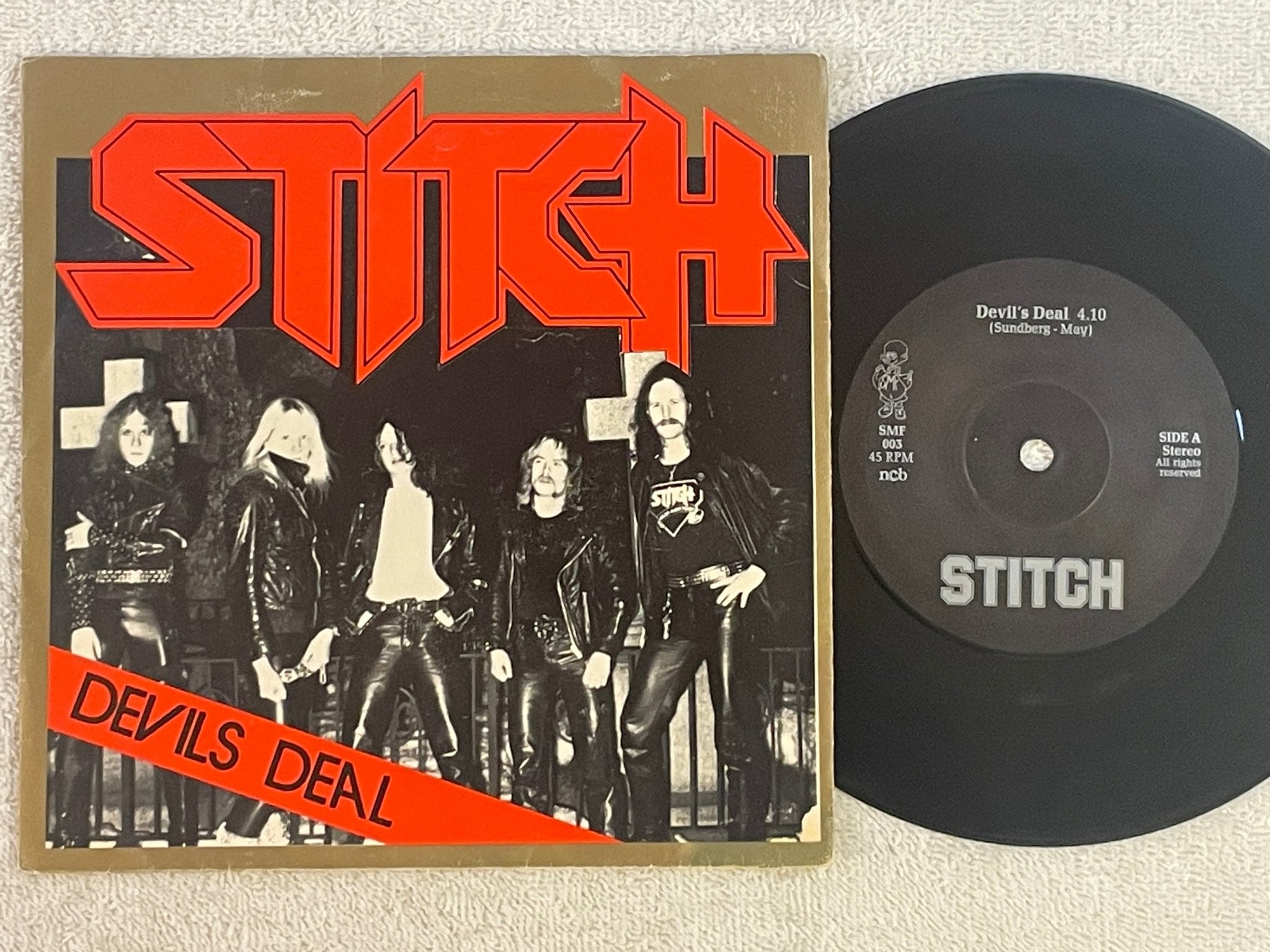 Omslagsbild för skivan STITCH devils deal 7"single -82 SMF 003 heavy metal ** RARE **