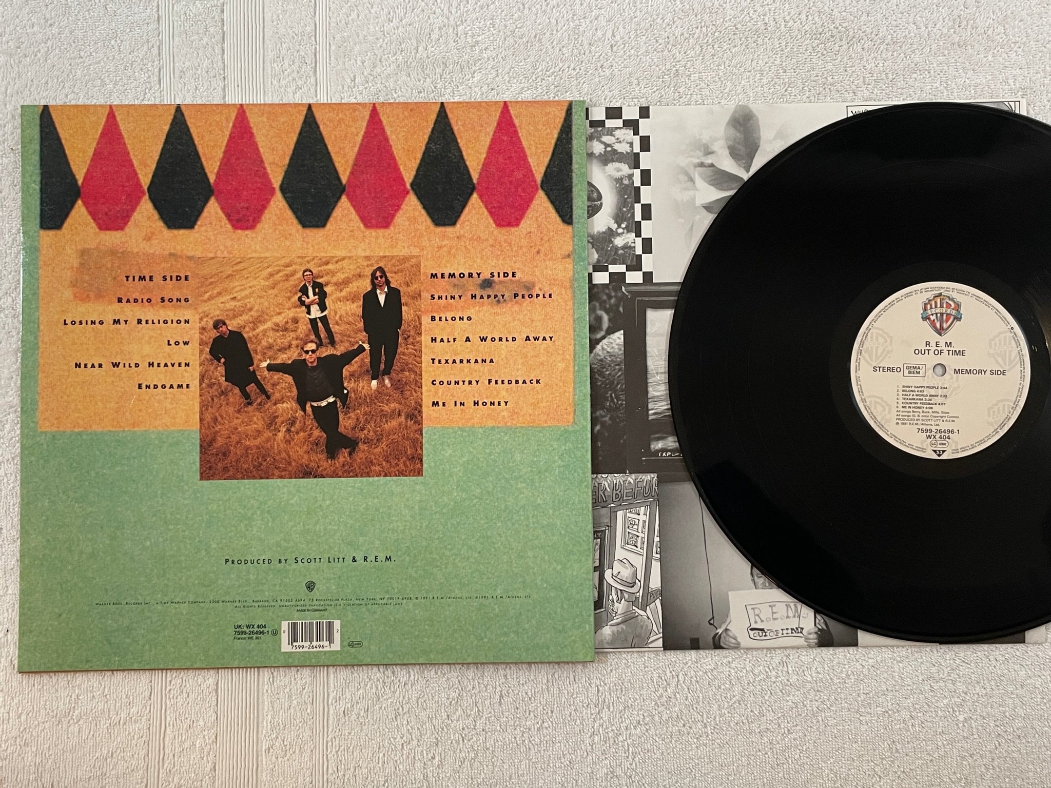 Omslagsbild för skivan R.E.M. out of time LP -91 WARNER BROS 7599 26496-1