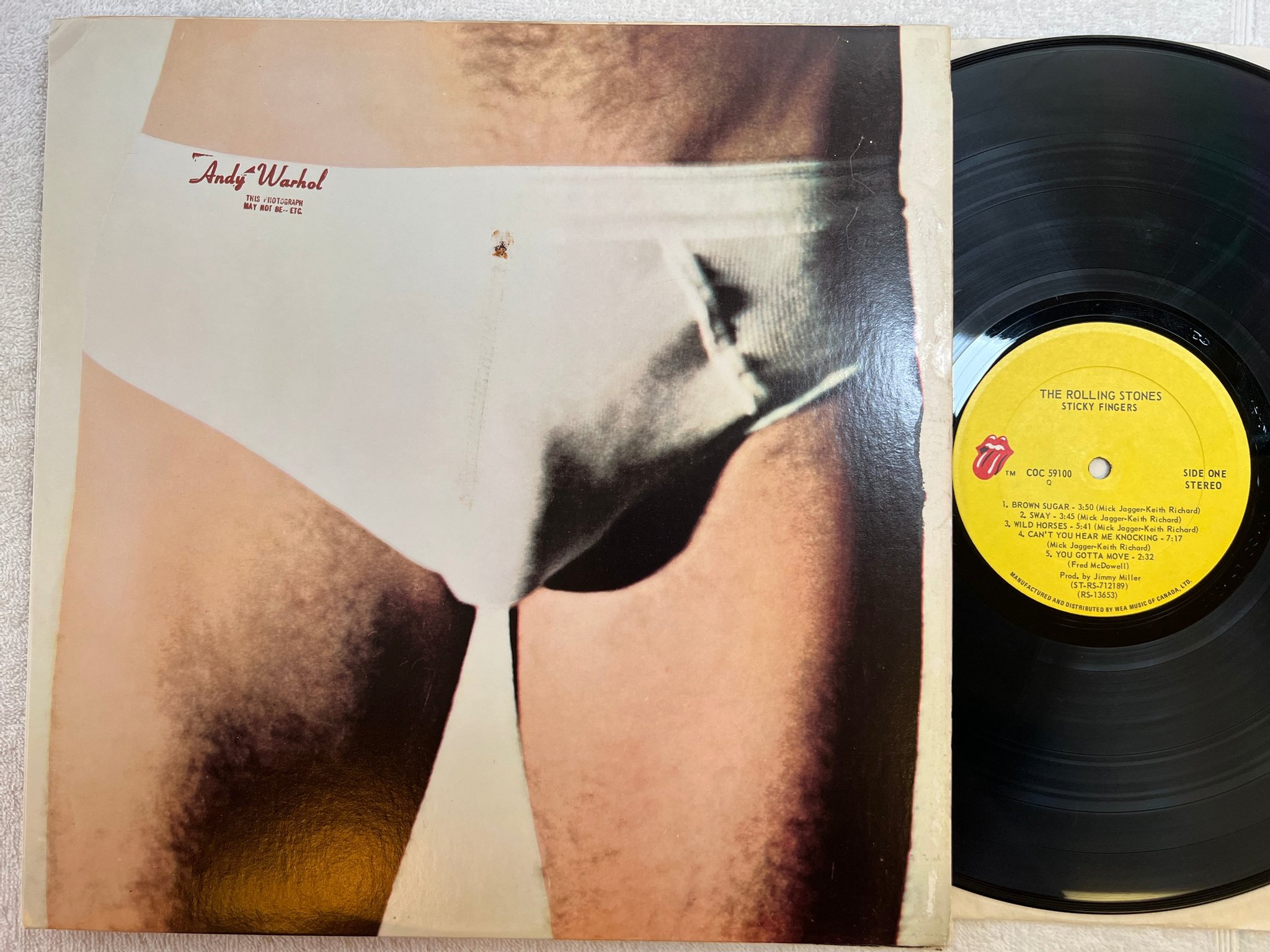Omslagsbild för skivan THE ROLLING STONES sticky fingers LP Can COC 59100 Andy Warhol cover art  **CLAS
