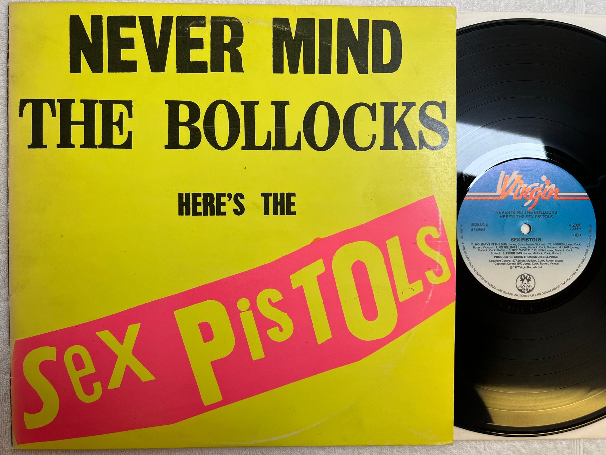 Omslagsbild för skivan SEX PISTOLS never mind the bollocks LP ncb VIRGIN V2086