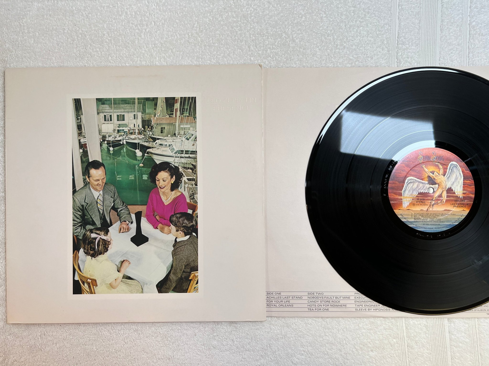 Omslagsbild för skivan LED ZEPPELIN precence LP -76 US SWAN SONG SS 8416