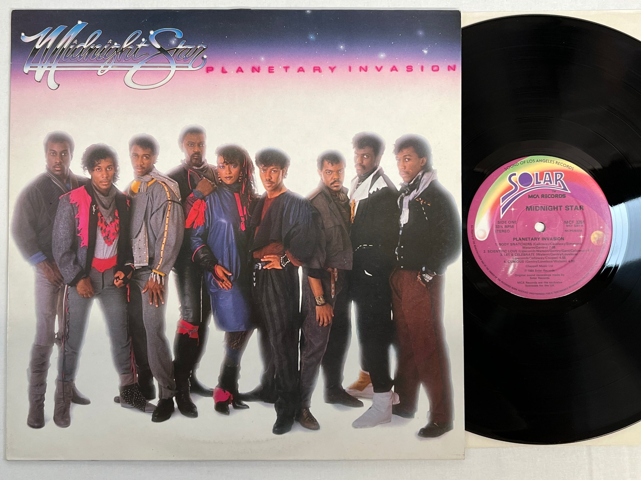 Omslagsbild för skivan MIDNIGHT STAR planetary invasion LP -84 UK SOLAR MCF 3251
