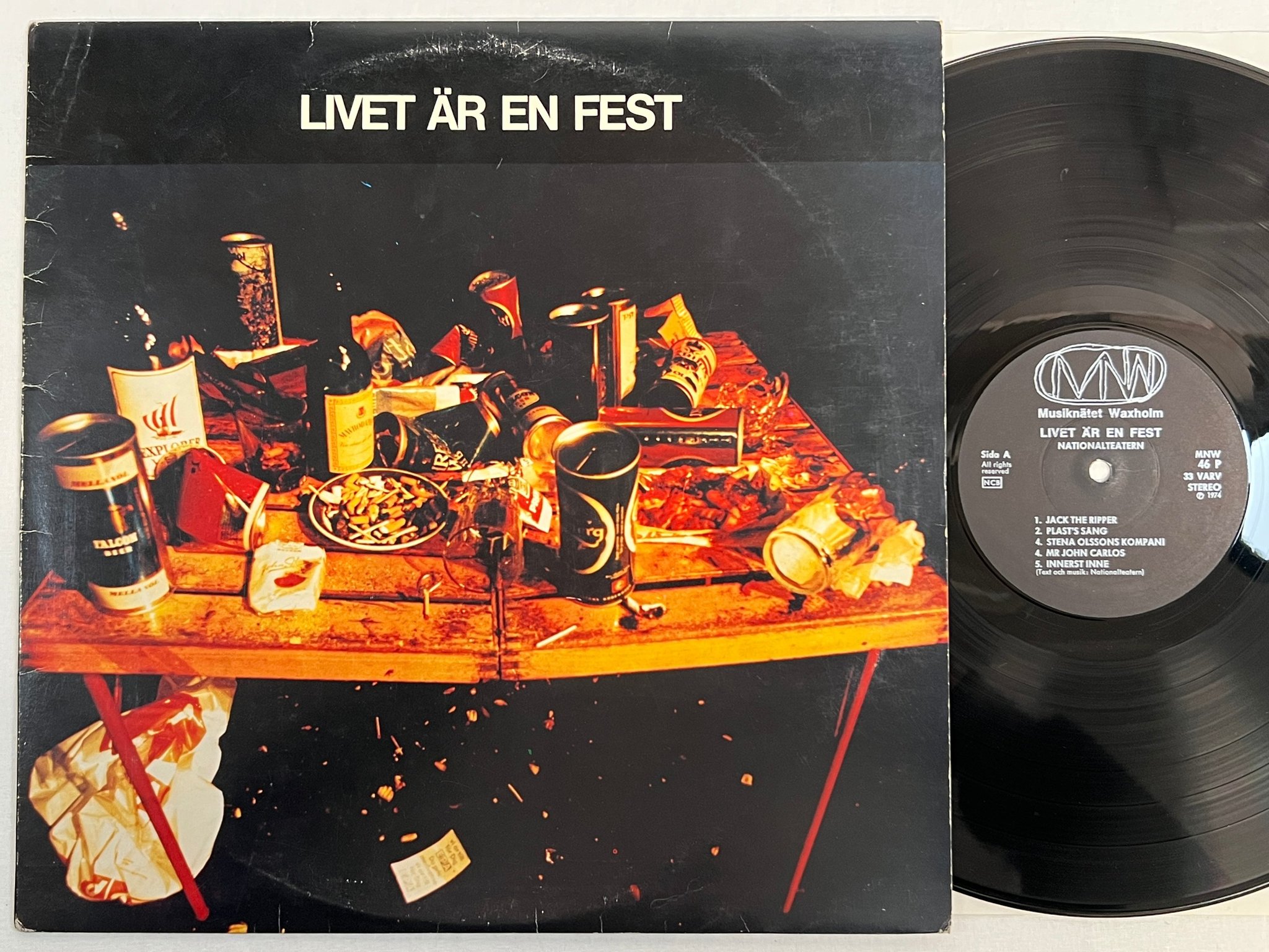 Omslagsbild för skivan NATIONALTEATERN livet är en fest LP -74 Swe MNW 46P