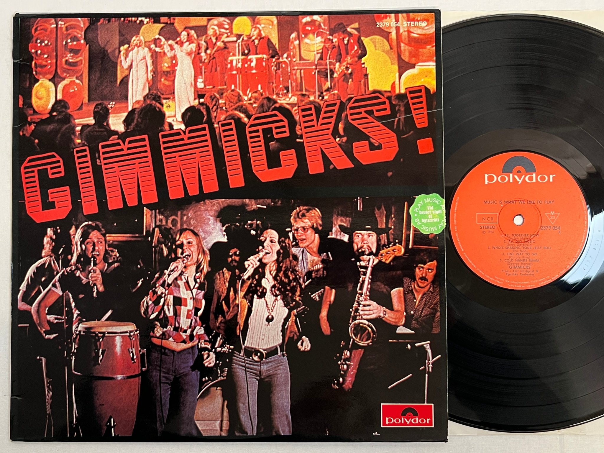 Omslagsbild för skivan GIMMICKS music is what we like to play LP -74 Swe POLYDOR 2379 054 funky