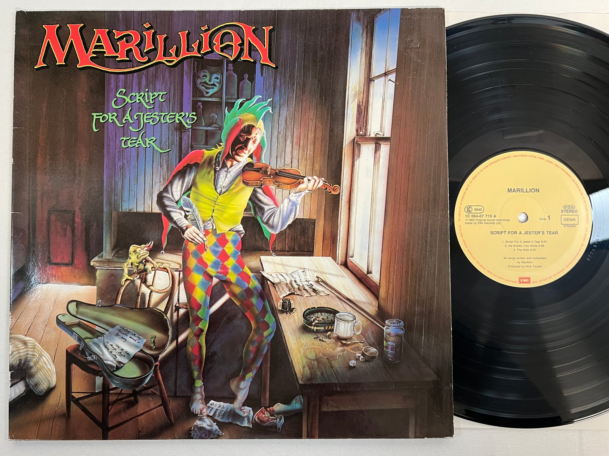 Omslagsbild för skivan MARILLION script for a jester's tear LP -83 EMI 1C 064 07715