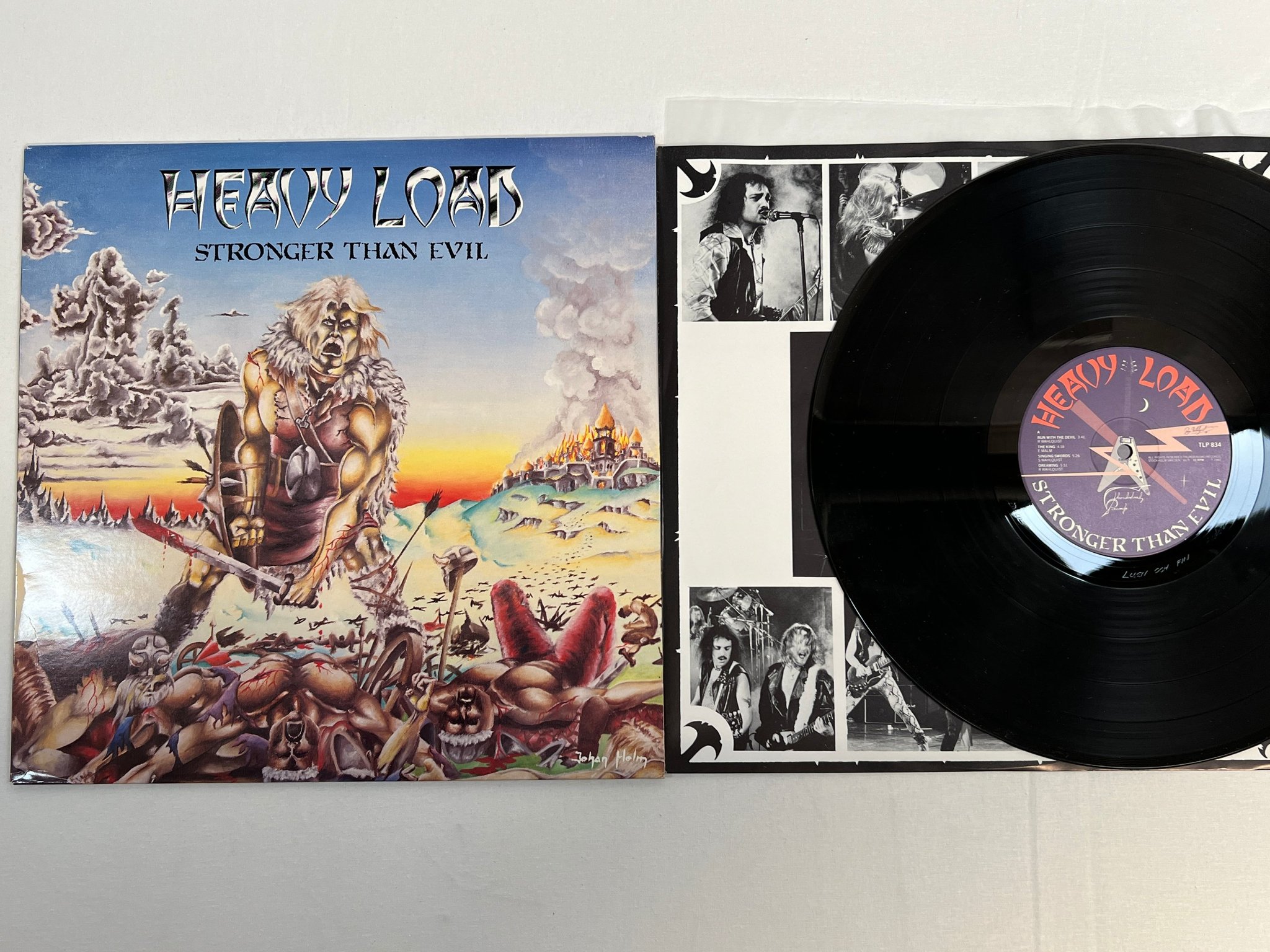 Omslagsbild för skivan HEAVY LOAD stronger than evil LP -83 Swe THUNDERLOAD TLP 834 