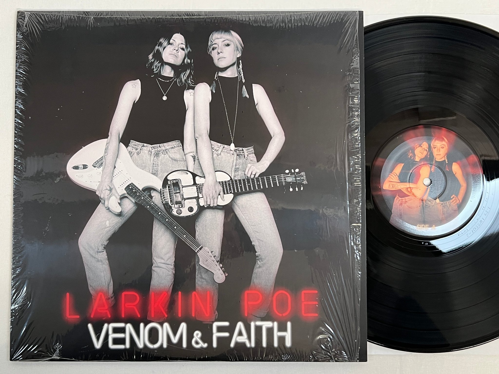Omslagsbild för skivan LARKIN POE Venom & Faith LP 2018 US TICKI WOO 