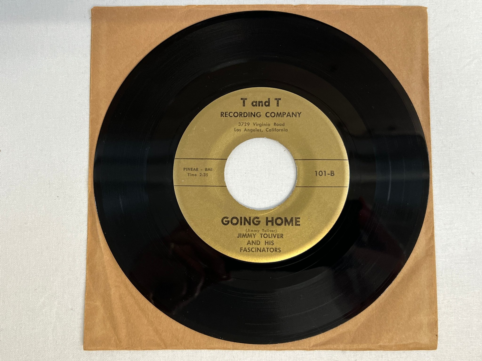 Omslagsbild för skivan JIMMY TOLIVER & HIS FASCINATORS going home 7"single T AND T 101 ** mega rare rhy