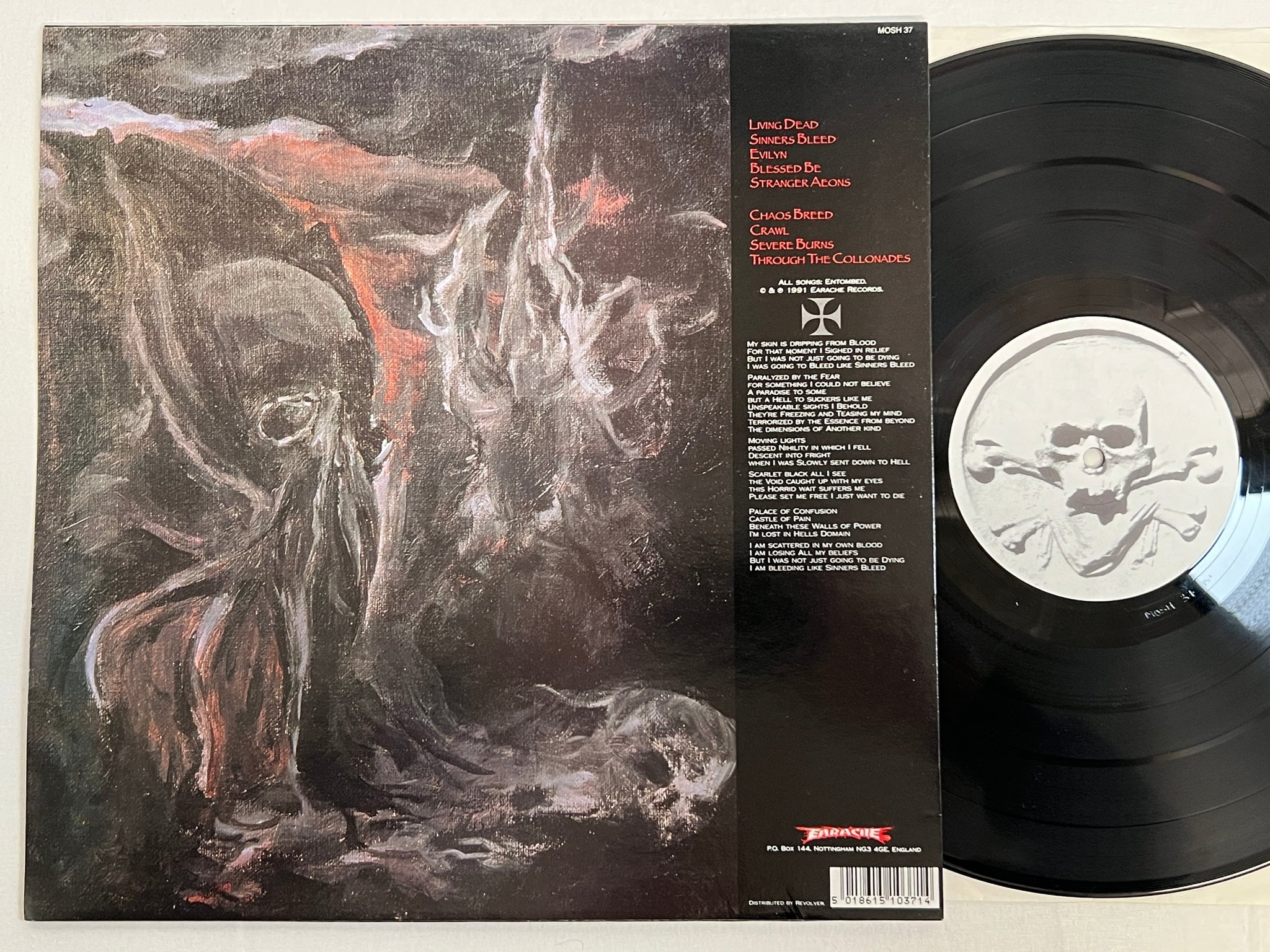 Omslagsbild för skivan ENTOMBED clandestine LP -92 UK EARACHE MOSH 37 ** rare death metal **