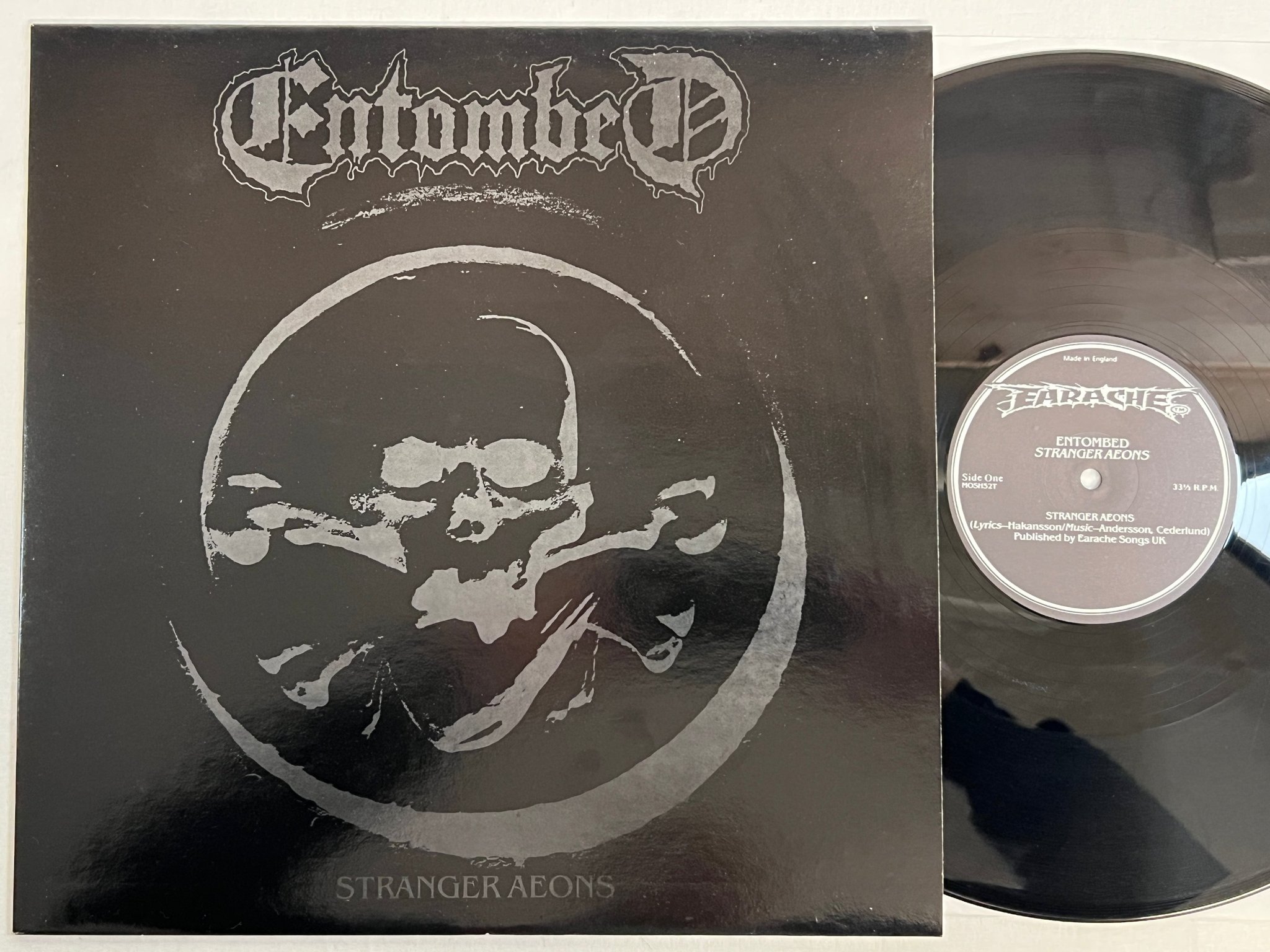 Omslagsbild för skivan ENTOMBED Stranger Aeons 12"ep -92 UK EARACHE MOSH 52T