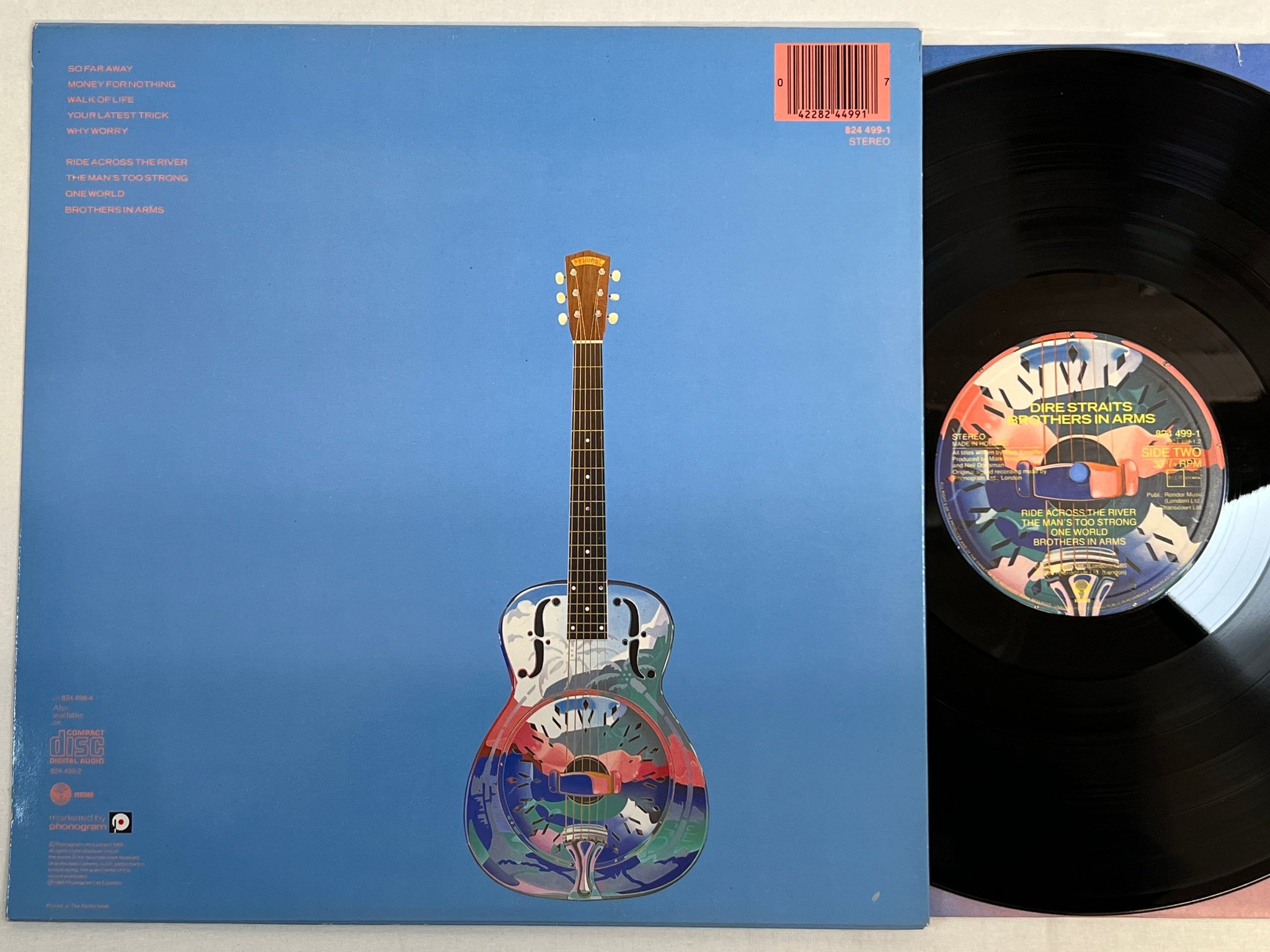 Omslagsbild för skivan DIRE STRAITS brothers in arms LP -85 Hol VERTIGO 824 499-1