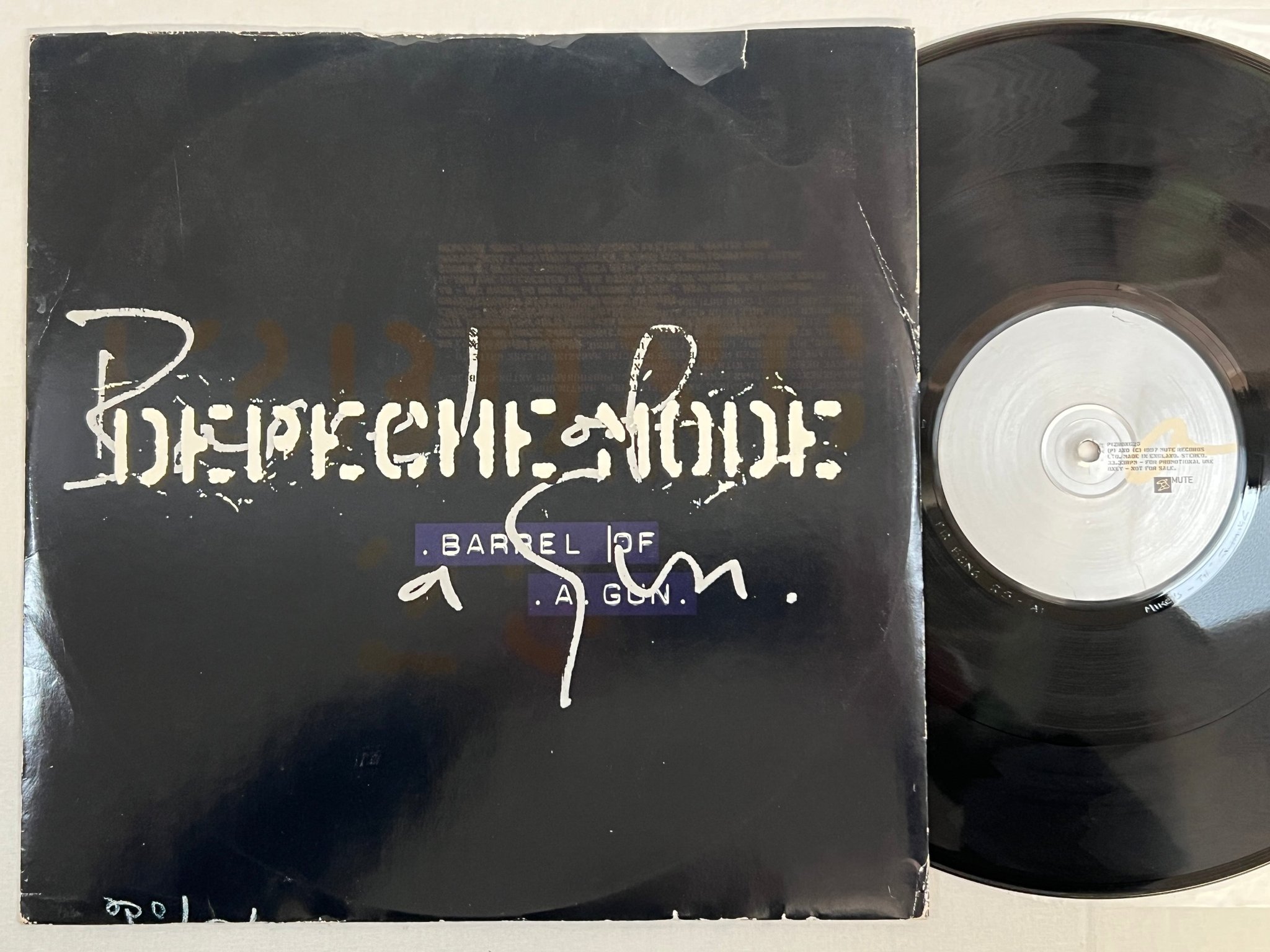 Omslagsbild för skivan DEPECHE MODE Barrel Of A Gun 12"single 1997 promo MUTE PL12Bong25