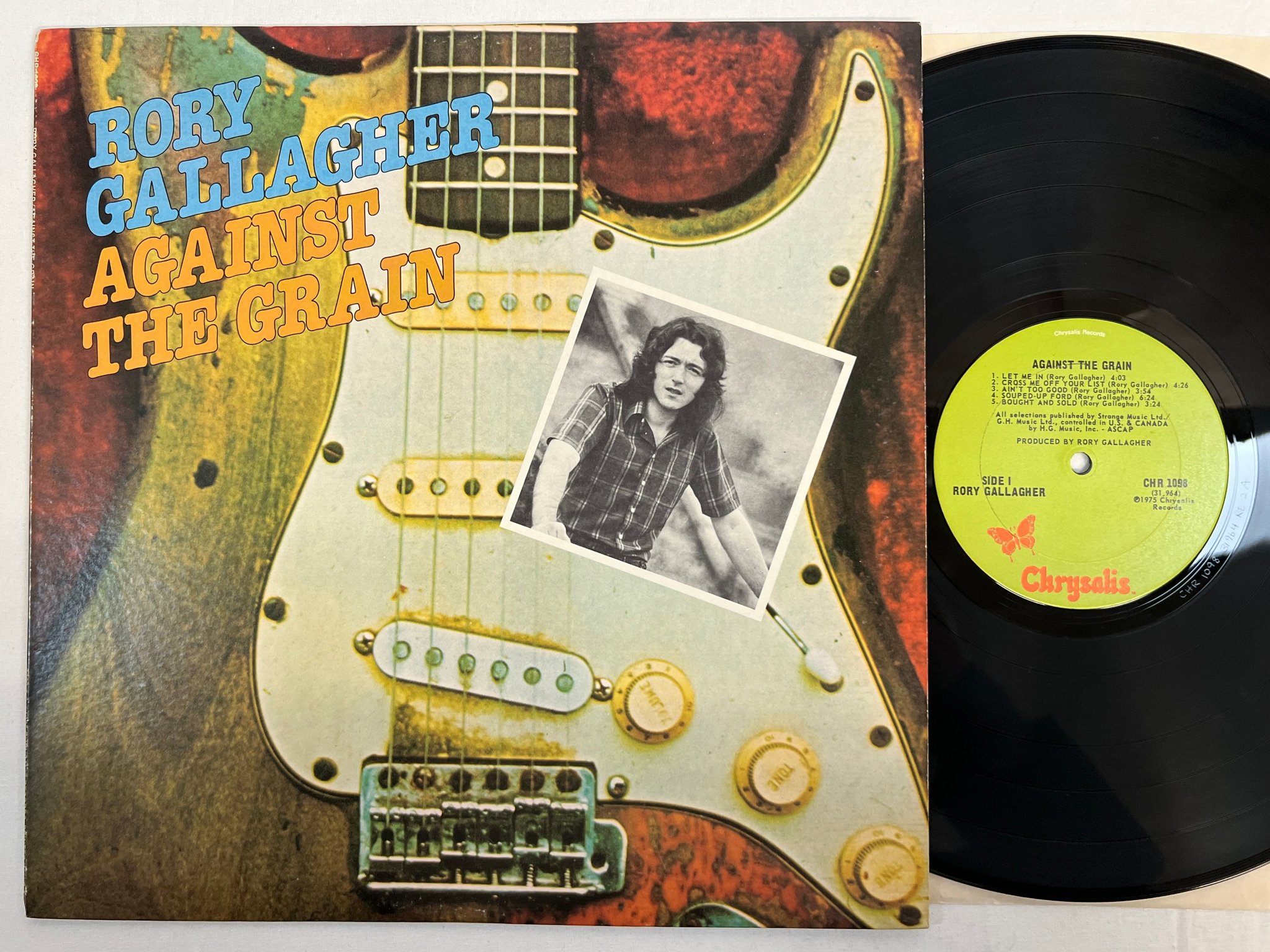 Omslagsbild för skivan RORY GALLAGHER against the grain LP -75 US CHRYSALIS CHR 1098
