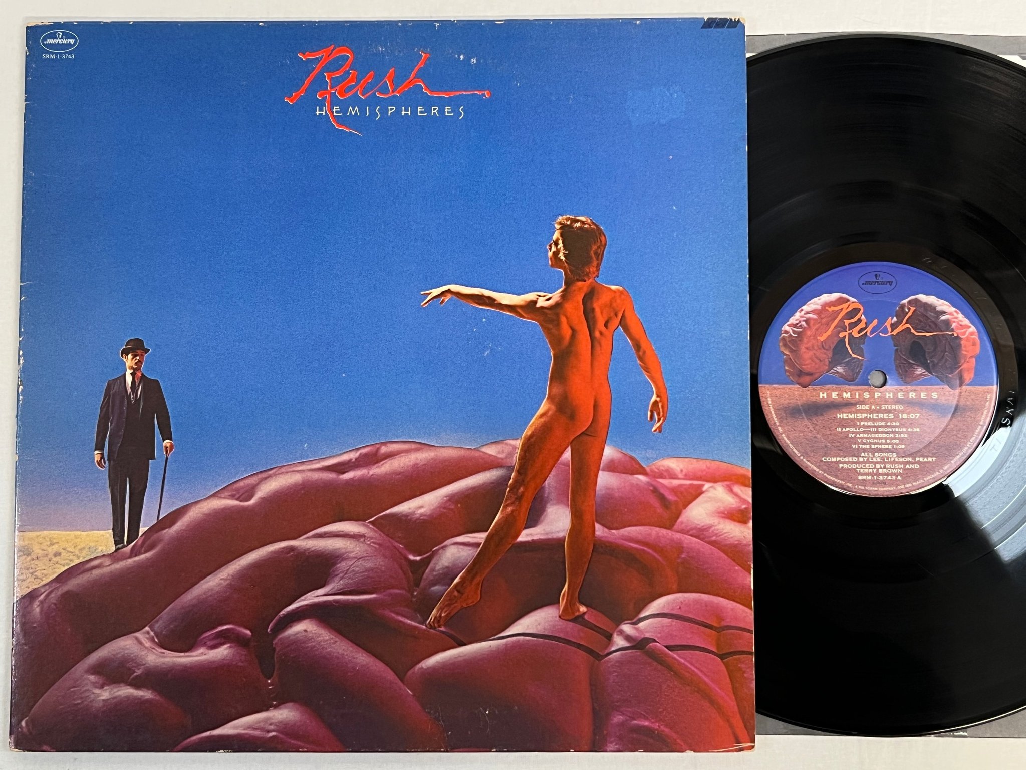 Omslagsbild för skivan RUSH hemispheres LP -78 US MERCURY SRM-1-3743