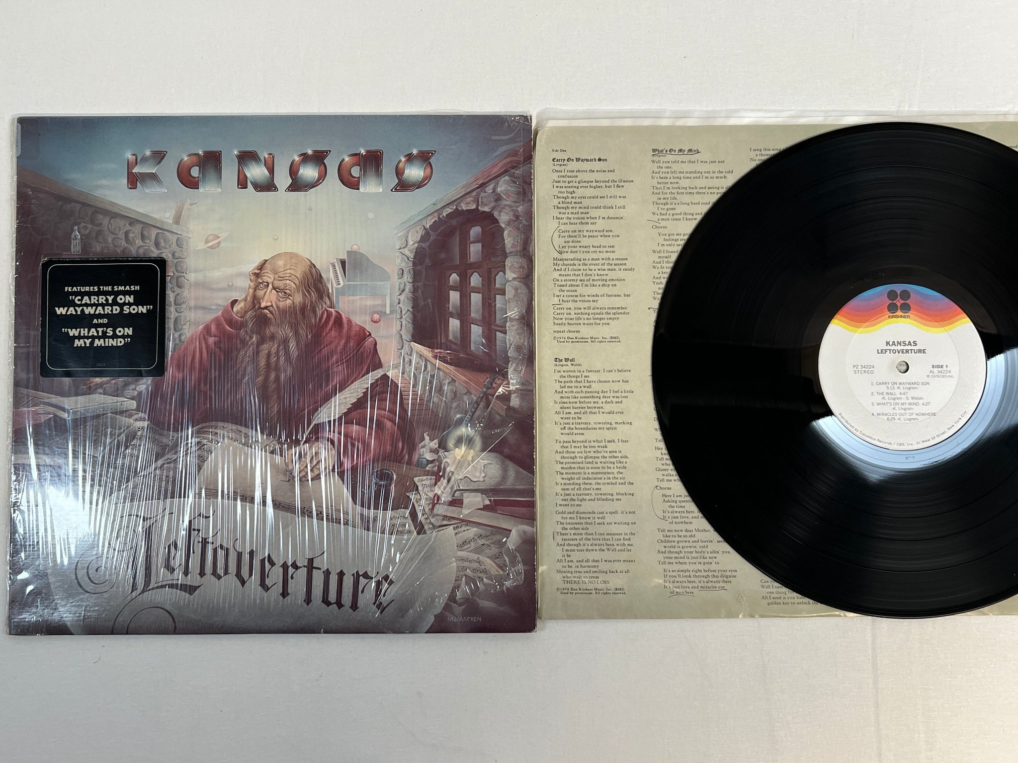 Omslagsbild för skivan KANSAS leftoverture LP -76 US KIRSHNER PZ 34224  " HYPE STICKER "