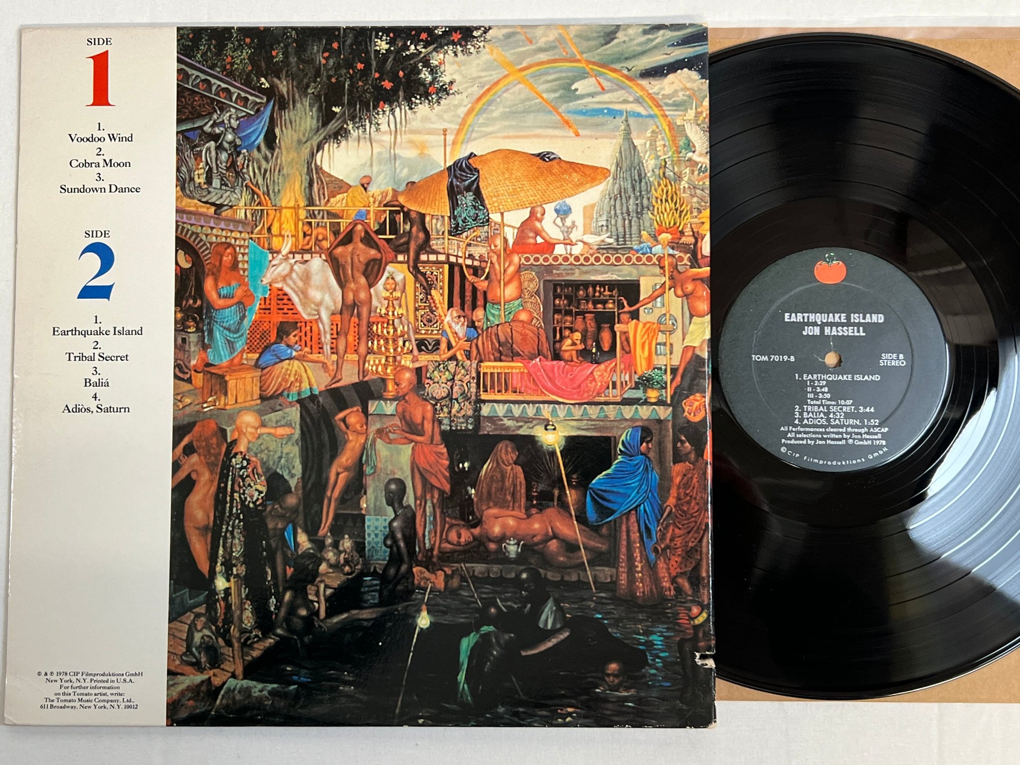 Omslagsbild för skivan JON HASSELL earthquake island LP -78 US TOMAT ROM 7019 RARE JAZZ