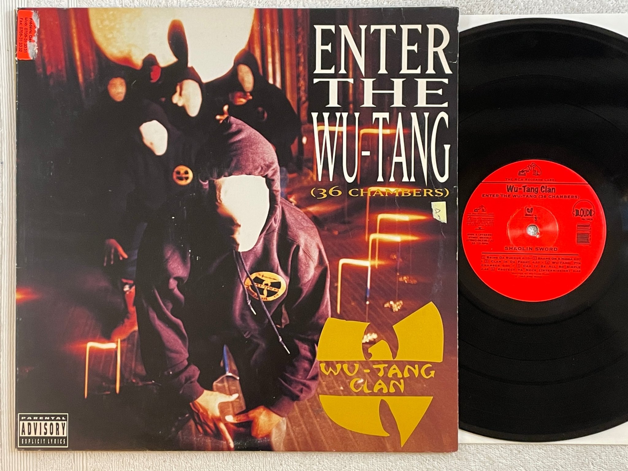 Omslagsbild för skivan WU-TANG CLAN Enter The Wu-Tang (36 Chambers) LP -93 US original LOUD ** RARE **
