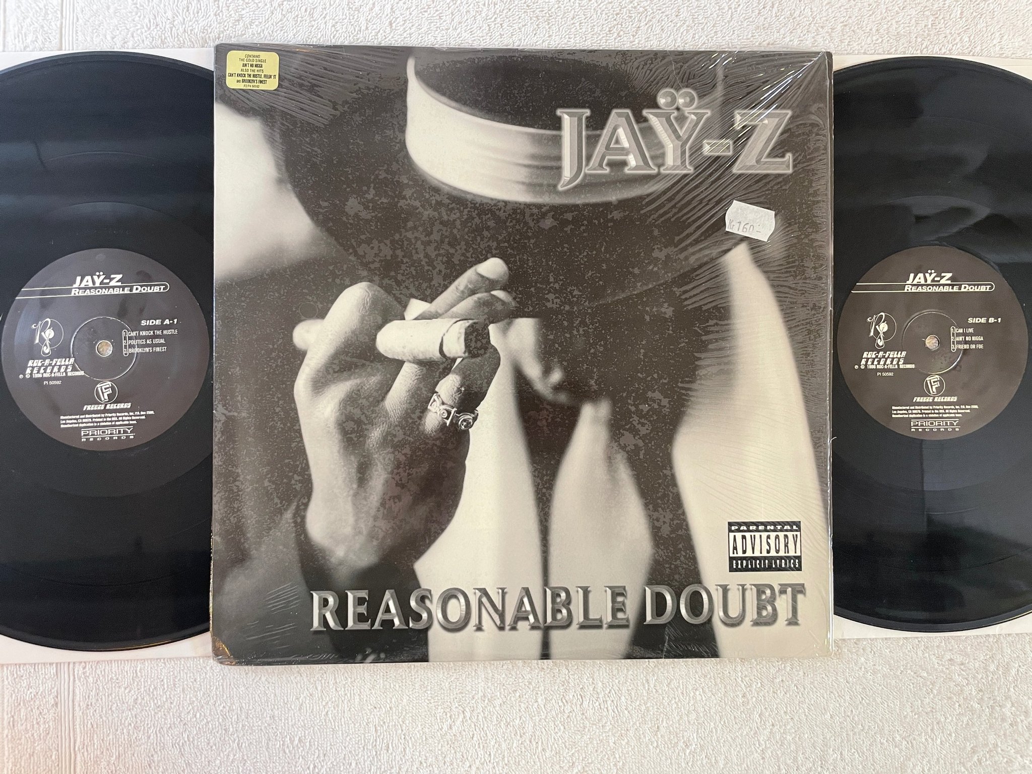 Omslagsbild för skivan JAY Z The Blueprint² The Gift & The Curse 4xLP 2002 US roc-a-fella 440 063 381-1