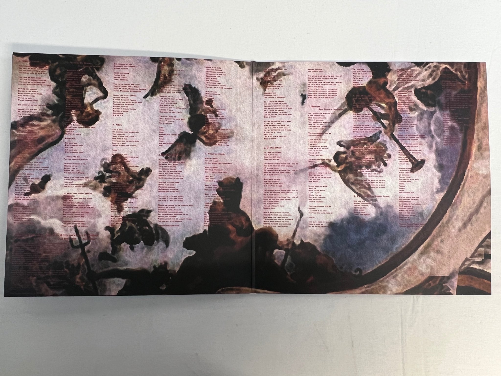 Omslagsbild för skivan ENTOMBED Serpent Saints / The Ten Amendments LP 2007 UK BOBV067LP RED VINYL