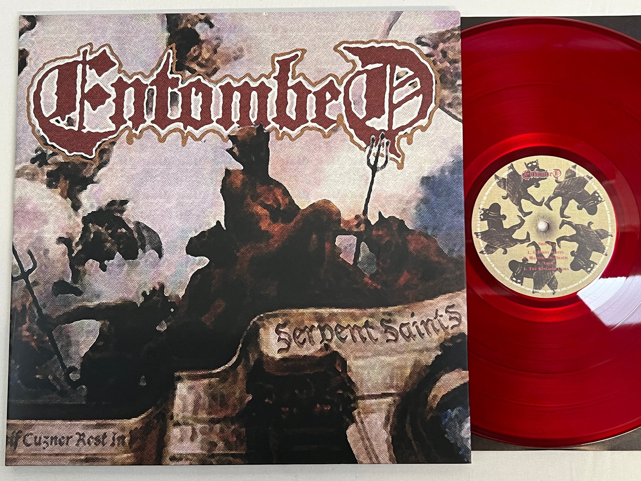 Omslagsbild för skivan ENTOMBED Serpent Saints / The Ten Amendments LP 2007 UK BOBV067LP RED VINYL