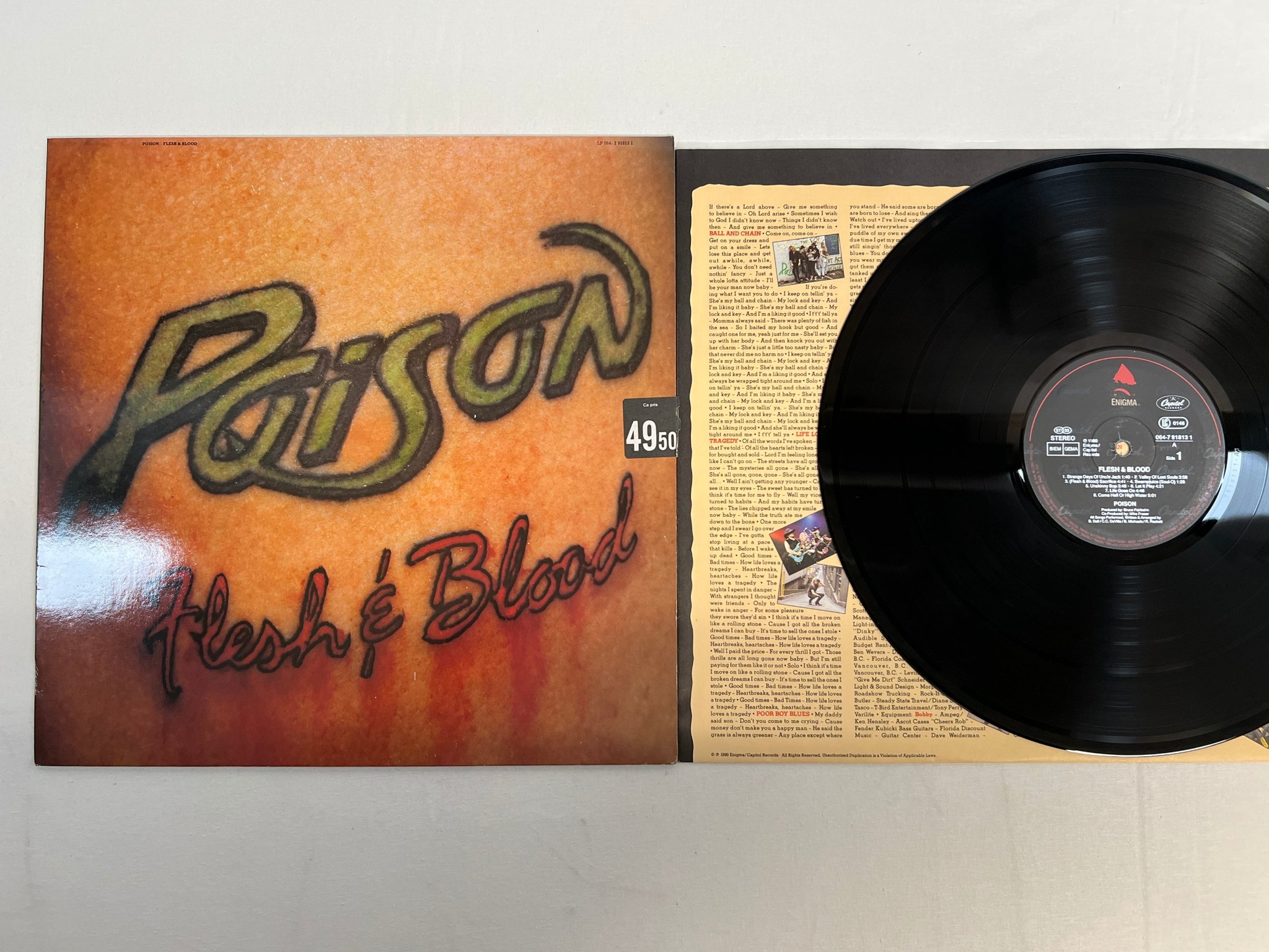 Omslagsbild för skivan POISON flesh & blood LP -90 Ger ENIGMA 064-7918131