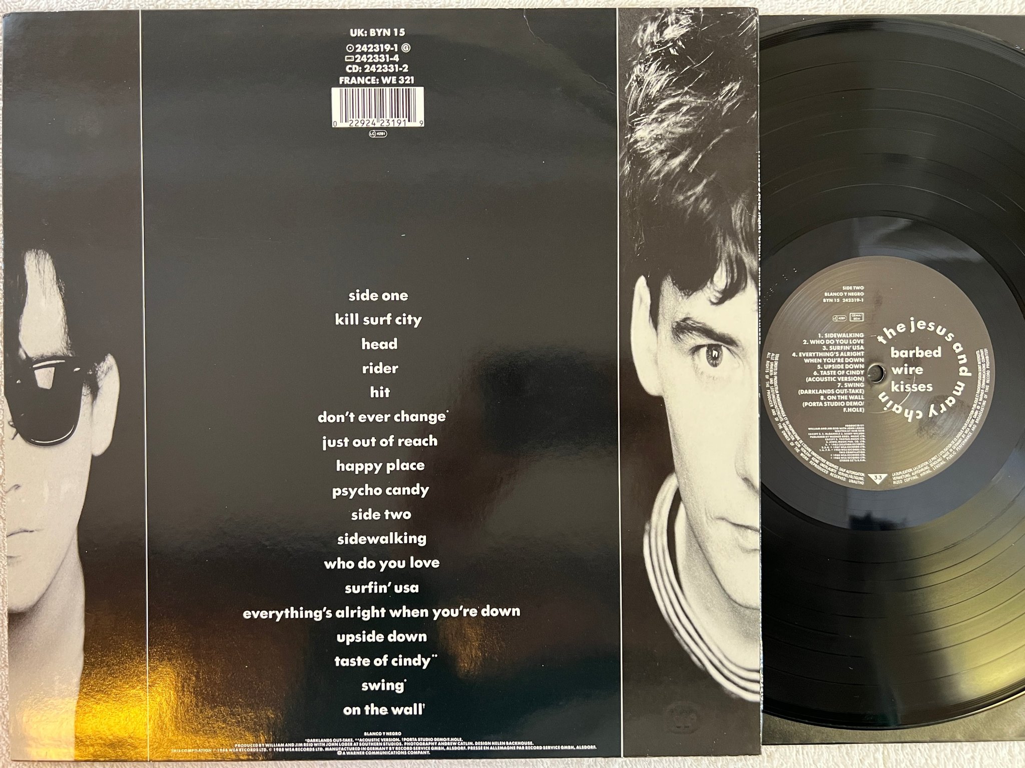 Omslagsbild för skivan THE JESUS AND MARY CHAIN barbed wire kisses LP -88 Ger BLANCO Y NEGRO BYN 15