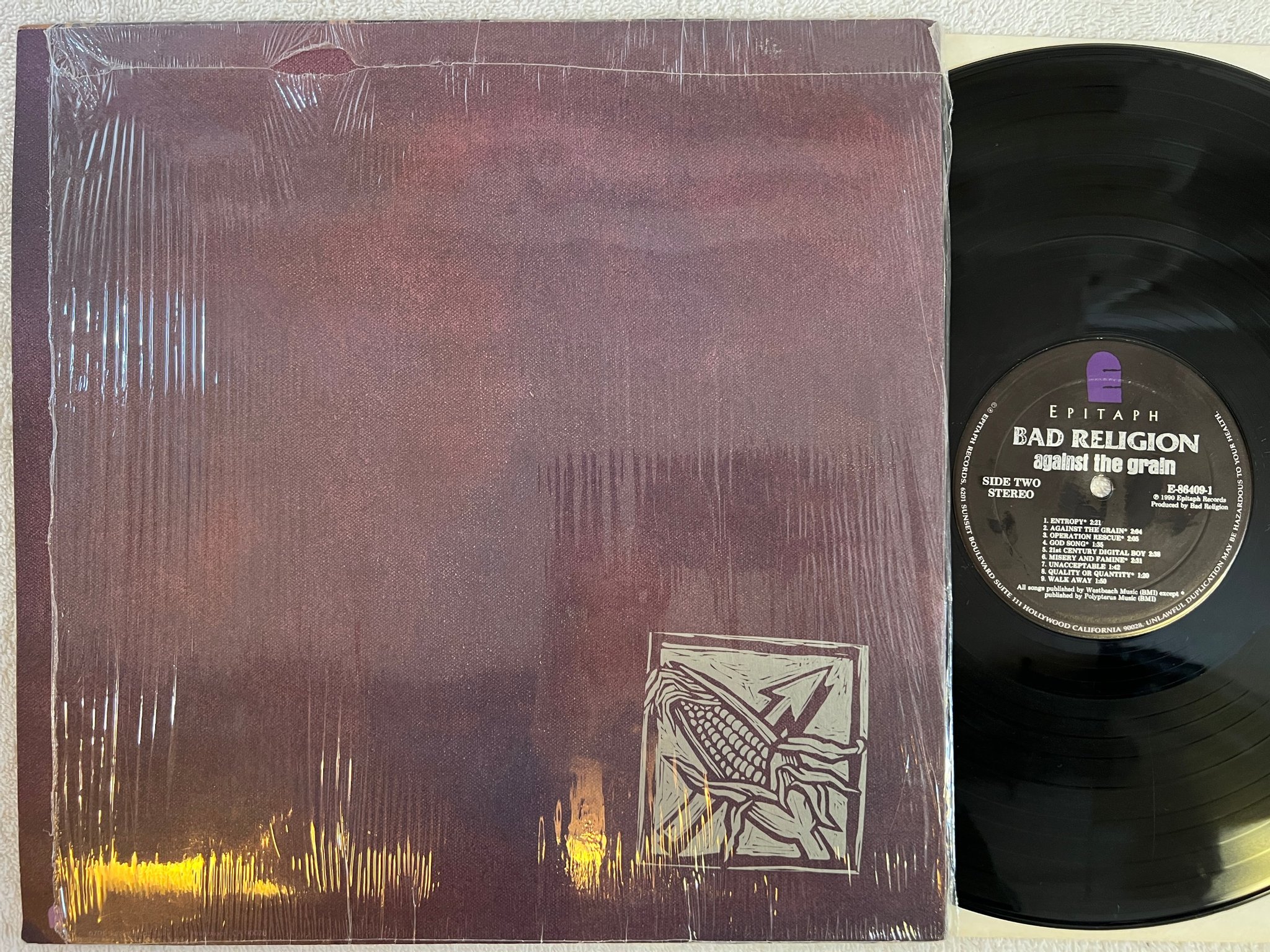 Omslagsbild för skivan BAD RELIGION against the grain LP -90 US EPITAPH E 86409-1 "hype sticker"