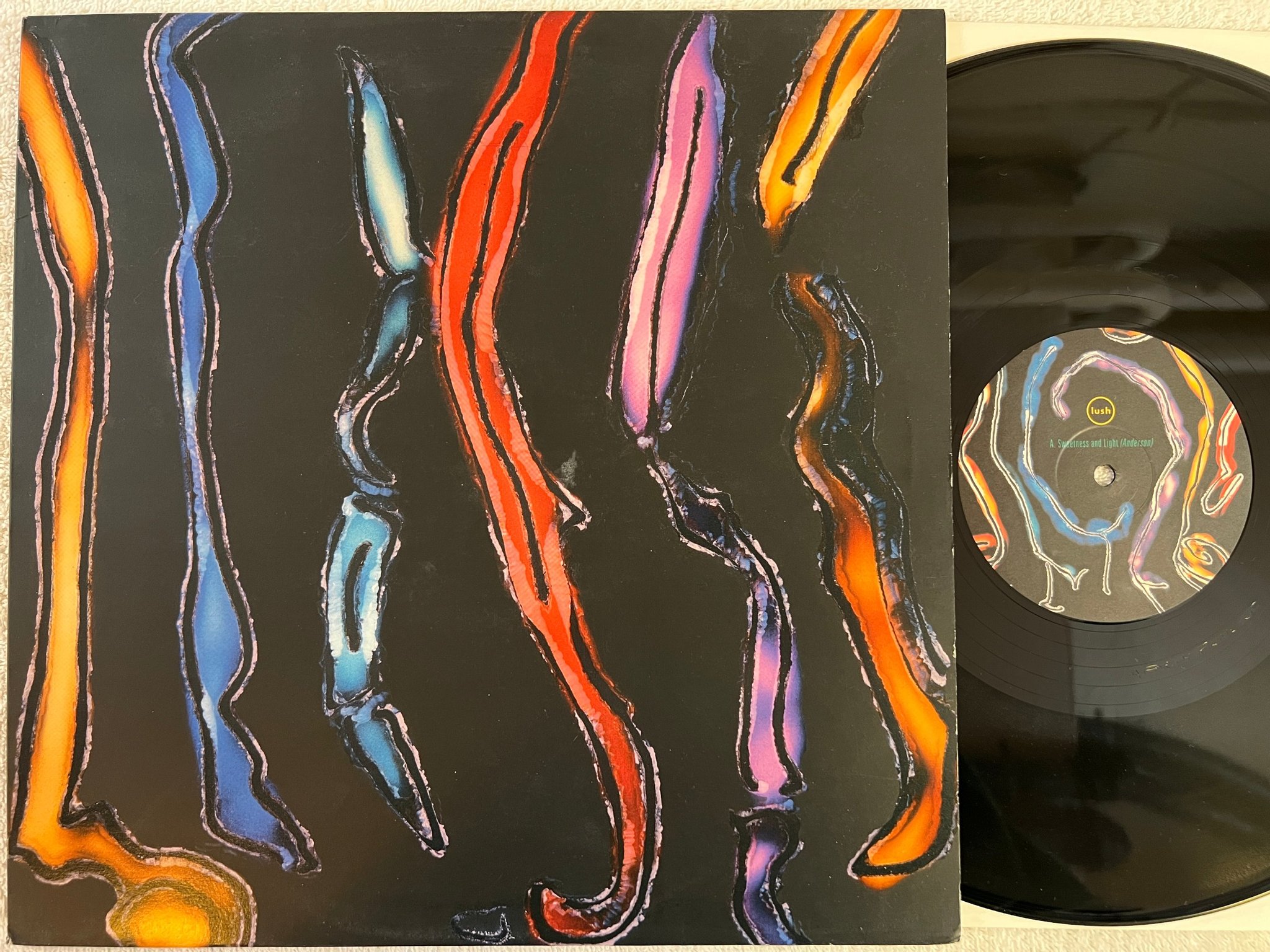 Omslagsbild för skivan LUSH Sweetness And Light 12"single -90 UK 4AD BAD 0013 indie rock 