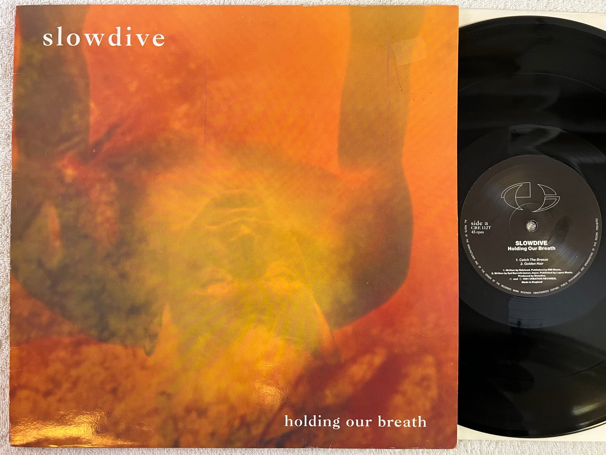 Omslagsbild för skivan SLOWDIVE holding our breath LP -91 UK CREATION CRE 112T indie rock