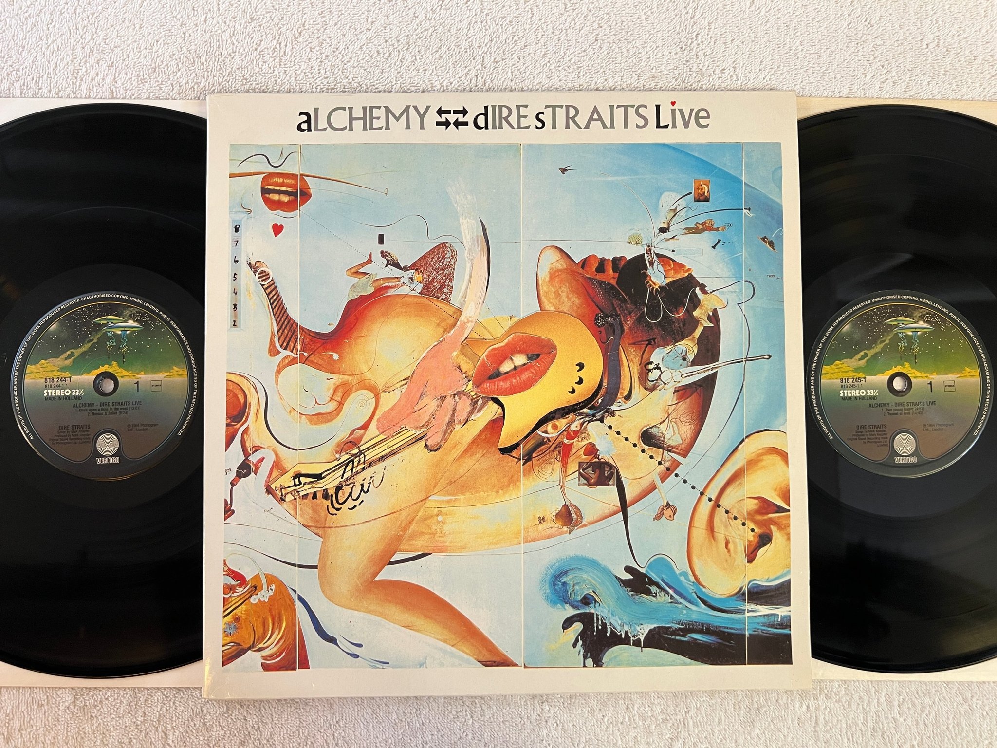 Omslagsbild för skivan DIRE STRAITS alchemy 2xLP -84 Hol VERTIGO 818244-1