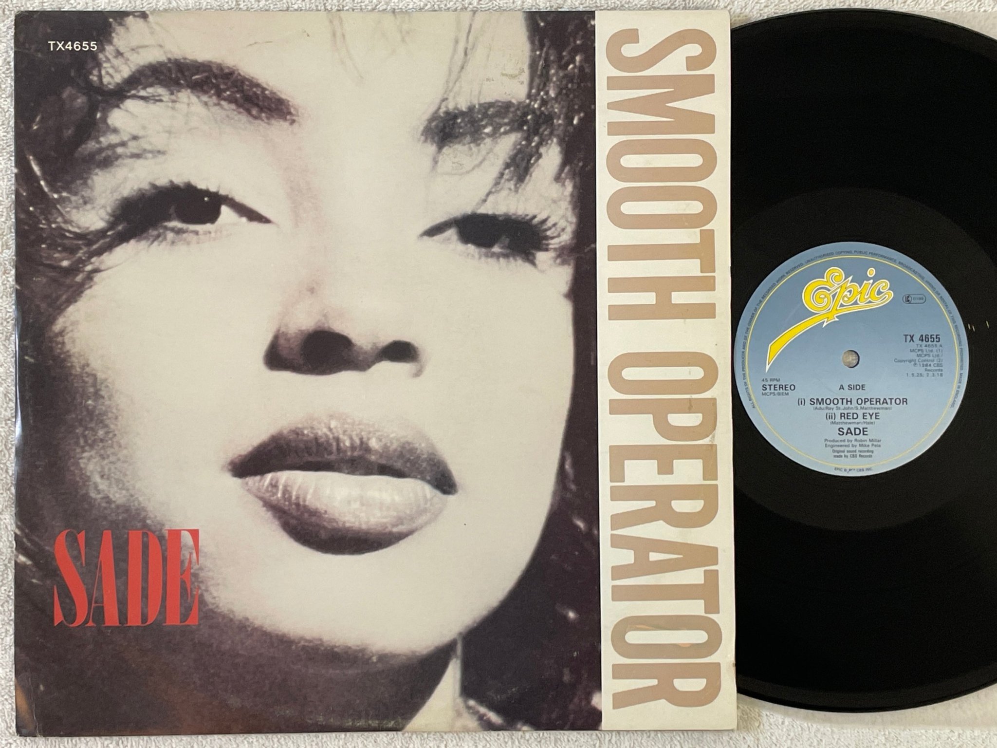 Omslagsbild för skivan SADE smooth operator 12"single -84 UK EPIC TX 4655